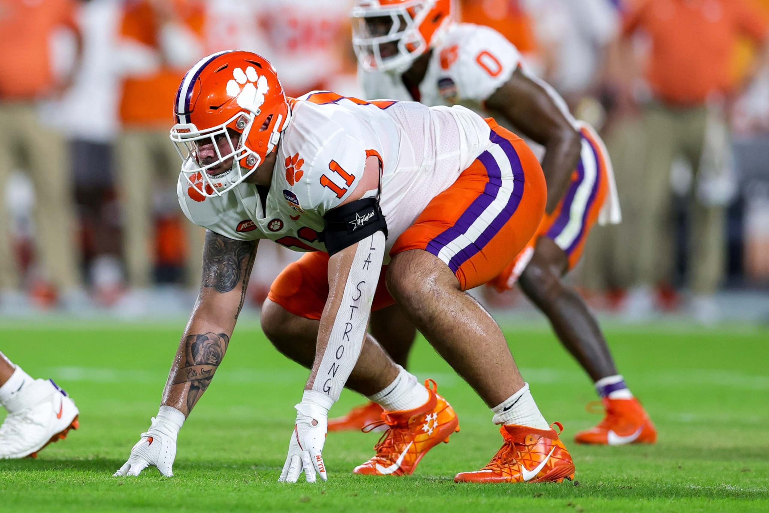 MIAMI GARDENS, FLORIDA - DECEMBER 30: Bryan Bresee #11 of the Clemson Tigers in action against the Tennessee Volunteers during the first half in the Capital One Orange Bowl at Hard Rock Stadium on December 30, 2022 in Miami Gardens, Florida. (Photo by Megan Briggs/Getty Images) MIAMI GARDENS, FLORIDA - DECEMBER 30: Bryan Bresee #11 of the Clemson Tigers in action against the Tennessee Volunteers during the first half in the Capital One Orange Bowl at Hard Rock Stadium on December 30, 2022 in Miami Gardens, Florida. (Photo by Megan Briggs/Getty Images)