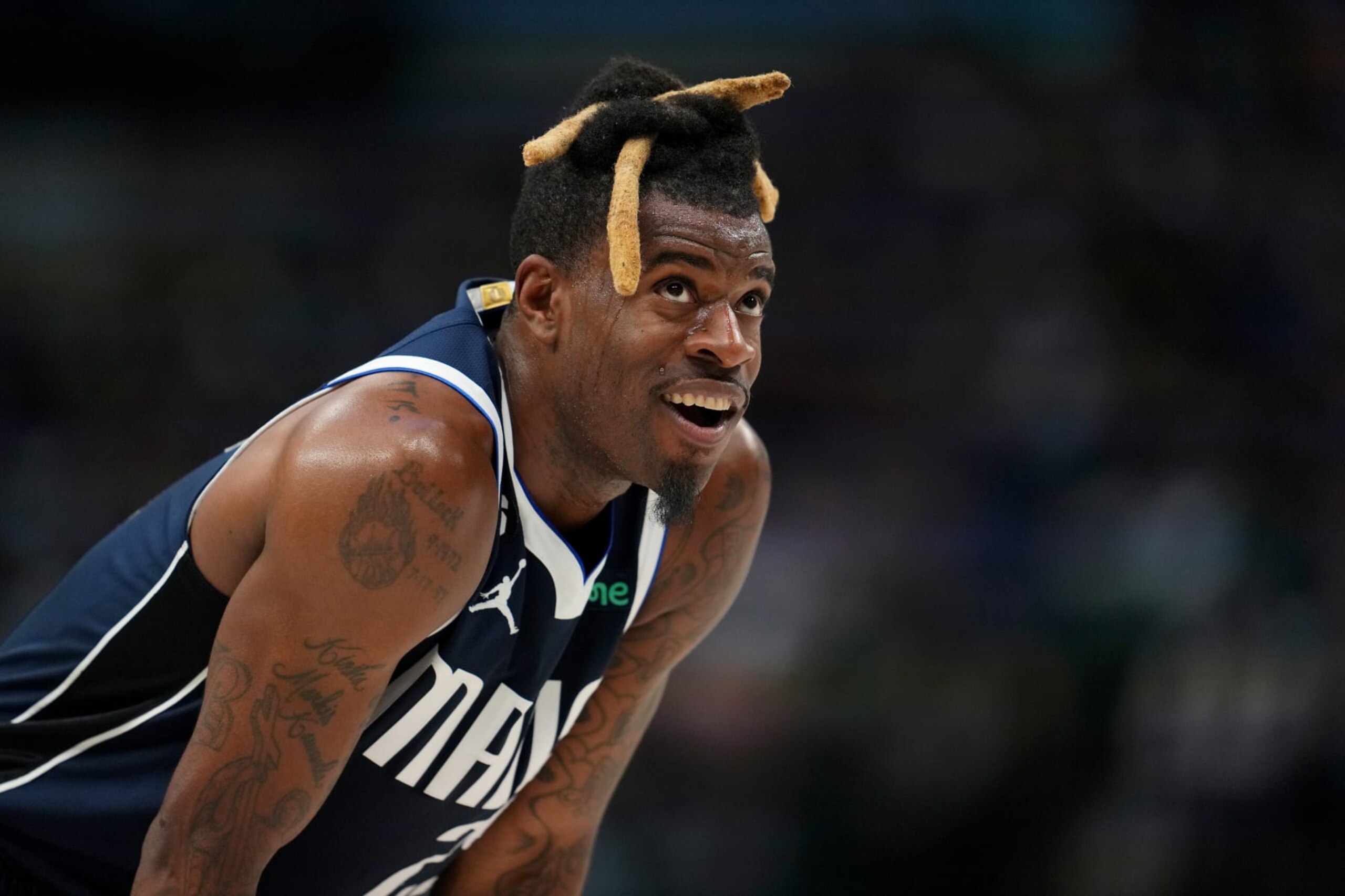 DALLAS, TX - MARCH 22:  Reggie Bullock #25 of the Dallas Mavericks looks on during the game against the Golden State Warriors on March 22, 2023 at the American Airlines Center in Dallas, Texas. NOTE TO USER: User expressly acknowledges and agrees that, by downloading and or using this photograph, User is consenting to the terms and conditions of the Getty Images License Agreement. Mandatory Copyright Notice: Copyright 2023 NBAE (Photo by Cooper Neill/NBAE via Getty Images)