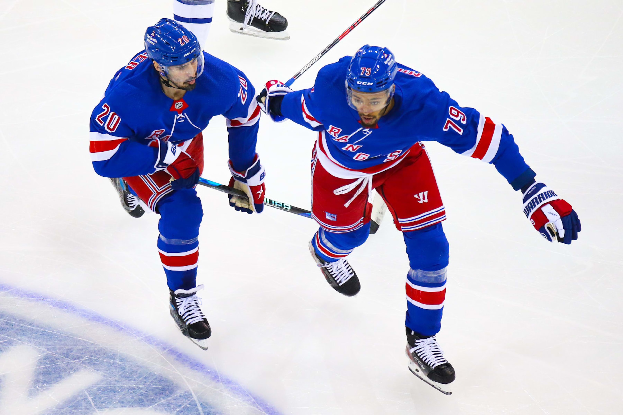 NEW YORK, NY - APRIL 13: New York Rangers Left Wing Chris Kreider (20) and New York Rangers Defenceman K'Andre Miller (79) in action during the third period of the National Hockey League game between the Toronto Maple Leafs and the New York Rangers on April 13, 2023 at Madison Square Garden in New York, NY. (Photo by Joshua Sarner/Icon Sportswire via Getty Images)