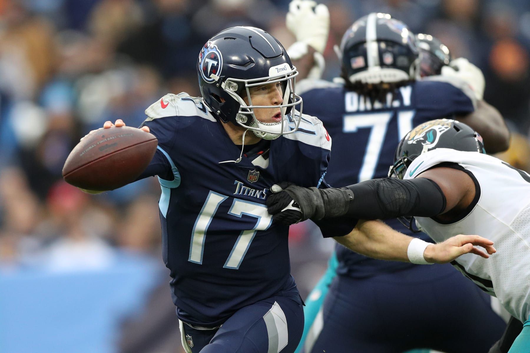 NASHVILLE, TENNESSEE - DECEMBER 11: Ryan Tannehill #17 of the Tennessee Titans scrambles with the ball during the second half of the game against the Jacksonville Jaguars at Nissan Stadium on December 11, 2022 in Nashville, Tennessee. (Photo by Justin Ford/Getty Images)