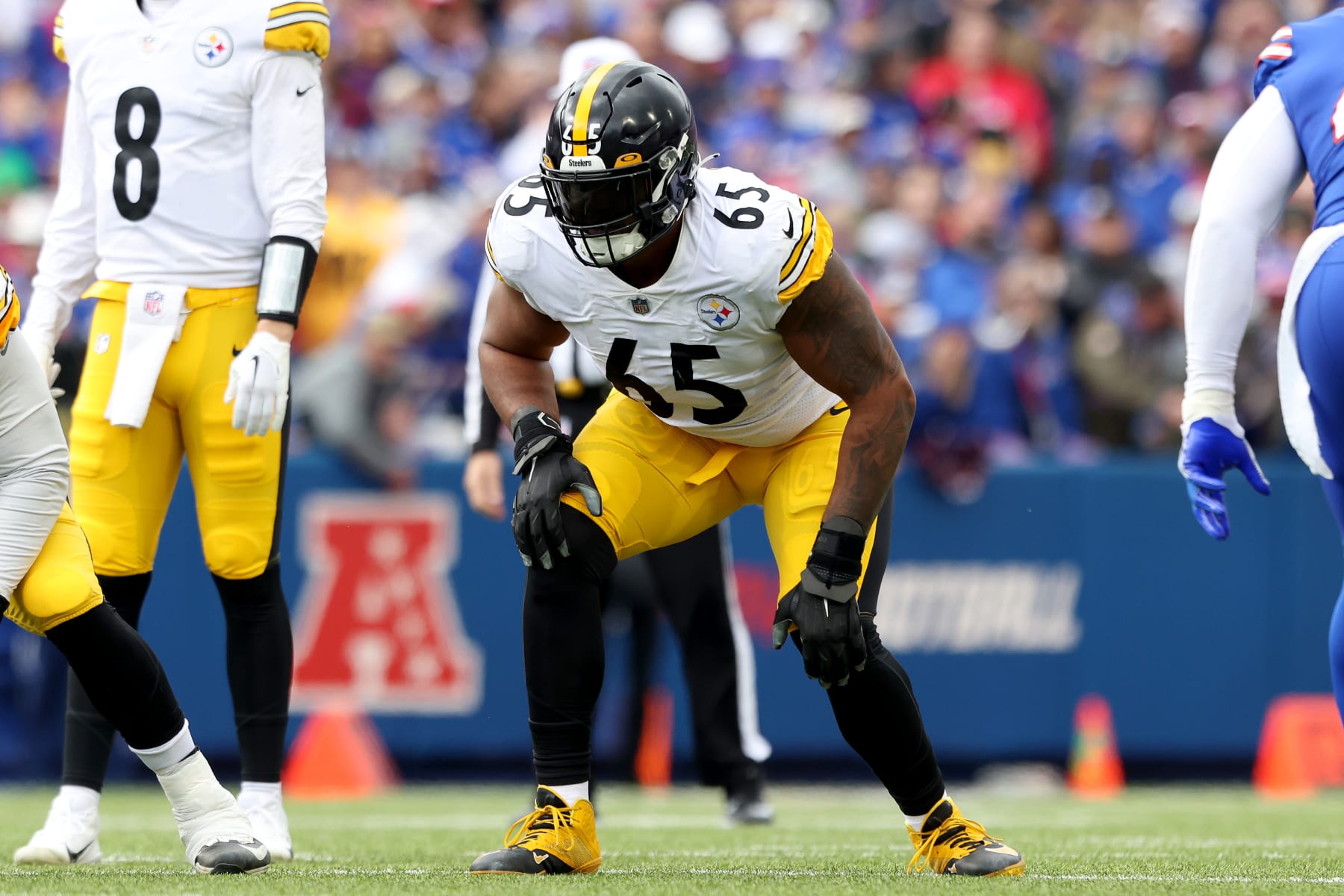 ORCHARD PARK, NEW YORK - OCTOBER 09: Dan Moore Jr. #65 of the Pittsburgh Steelers lines up during the first quarter against the Buffalo Bills at Highmark Stadium on October 09, 2022 in Orchard Park, New York. (Photo by Bryan Bennett/Getty Images)