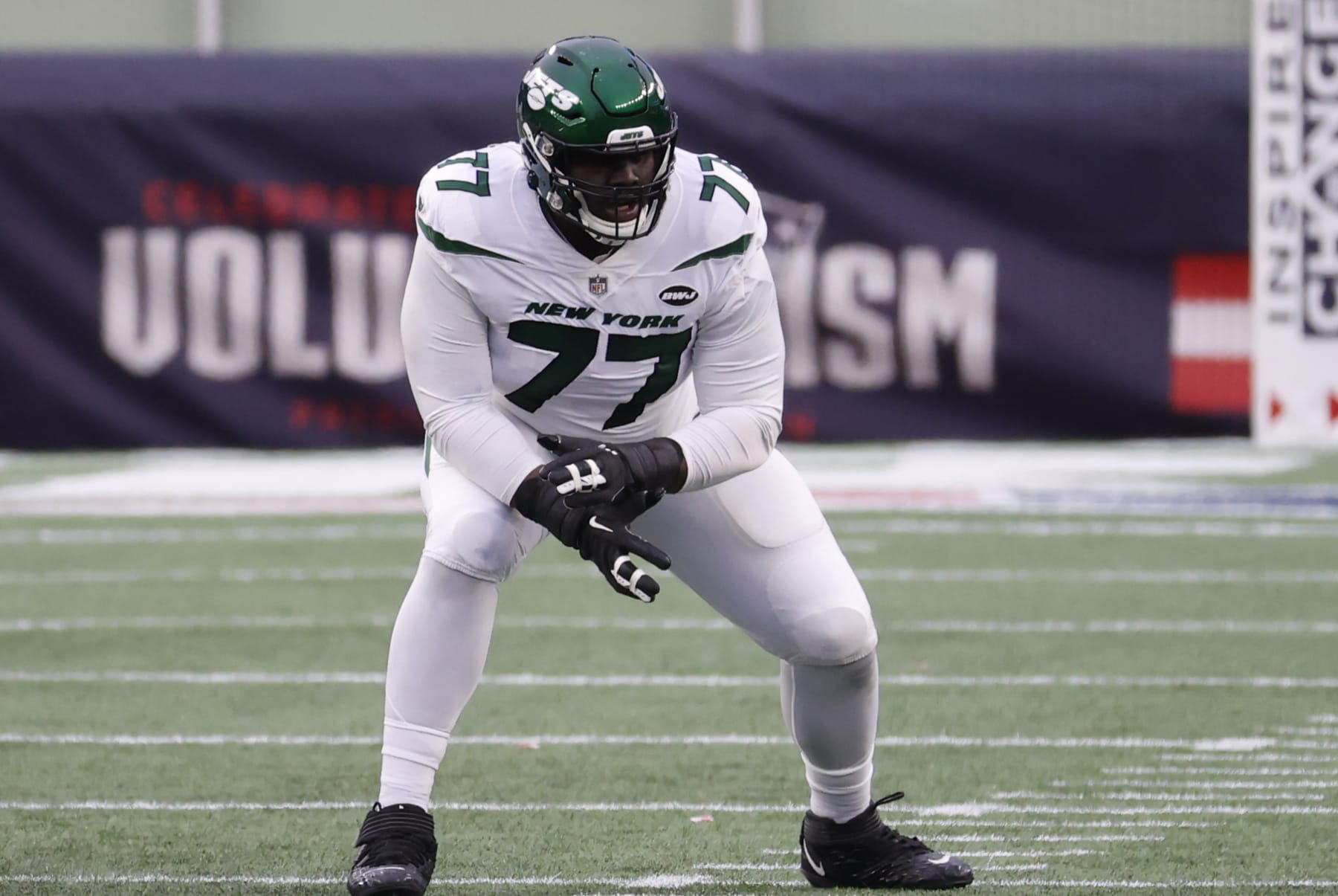 FOXBOROUGH, MA - JANUARY 03: New York Jets offensive tackle Mekhi Becton (77) gets set  during a game between the New England Patriots and the New York Jets on January 3, 2021, at Gillette Stadium in Foxborough, Massachusetts. (Photo by Fred Kfoury III/Icon Sportswire via Getty Images)