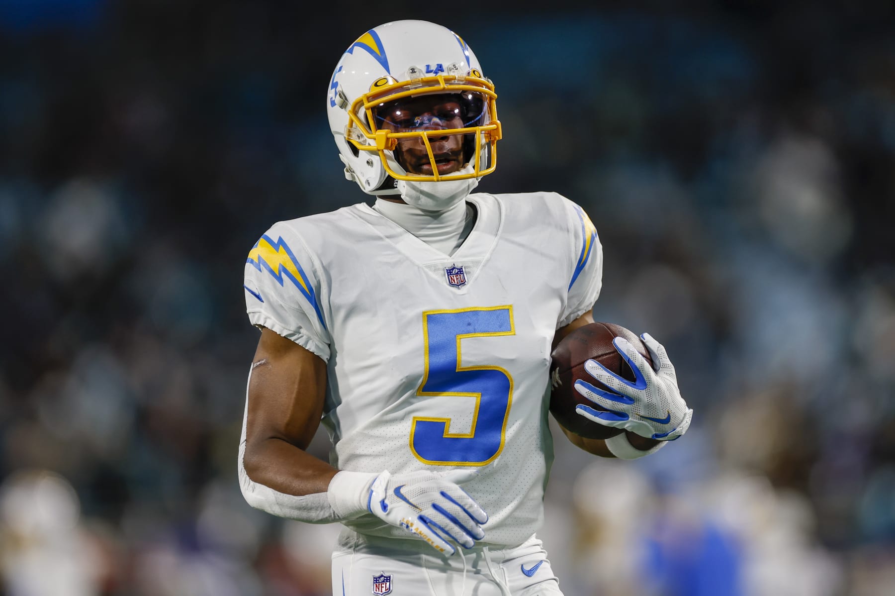 JACKSONVILLE, FL - JANUARY 14: Los Angeles Chargers wide receiver Joshua Palmer (5) runs with the ball during the game between the Los Angeles Chargers and the Jacksonville Jaguars on January 14, 2023 at TIAA Bank Field in Jacksonville, Fl. (Photo by David Rosenblum/Icon Sportswire via Getty Images)
