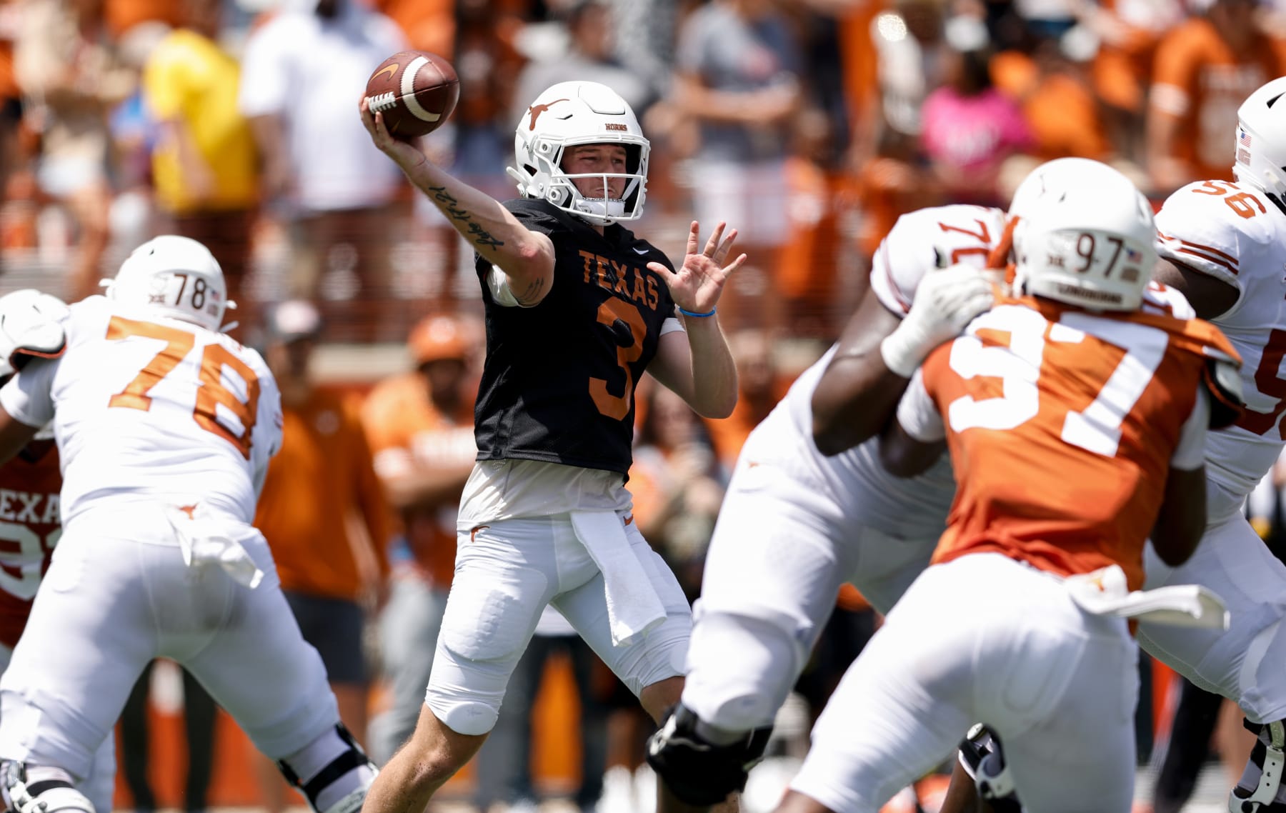 AUSTIN, TEXAS - APRIL 15: Quinn Ewers #3 of the Texas Longhorns throws a pass during the Texas Football Orange-White Spring Football Game at Darrell K Royal-Texas Memorial Stadium on April 15, 2023 in Austin, Texas. (Photo by Tim Warner/Getty Images)
