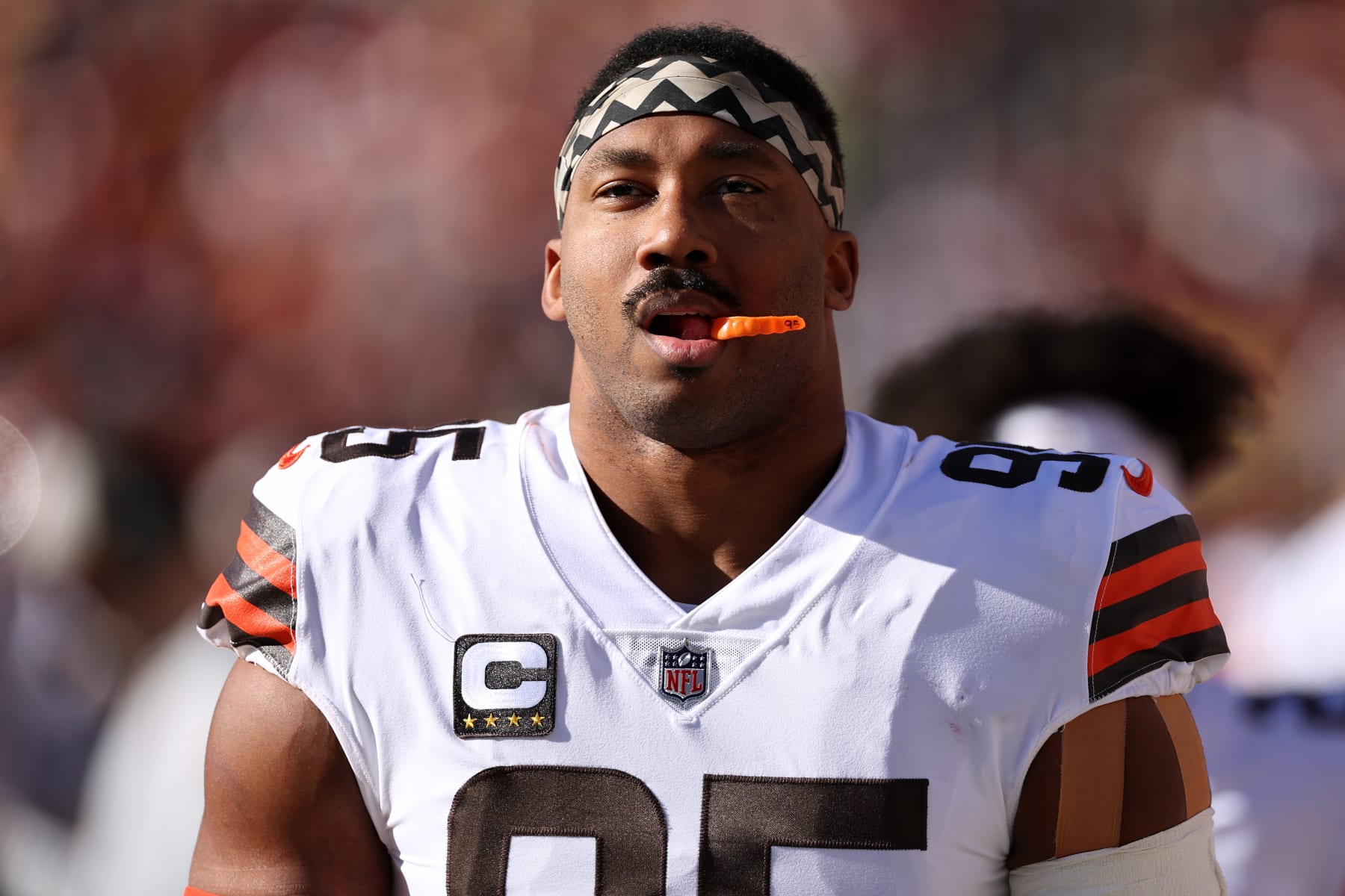 LANDOVER, MARYLAND - JANUARY 01: Myles Garrett #95 of the Cleveland Browns looks on from the sidelines during the first quarter against the Washington Commanders at FedExField on January 01, 2023 in Landover, Maryland. (Photo by Scott Taetsch/Getty Images)