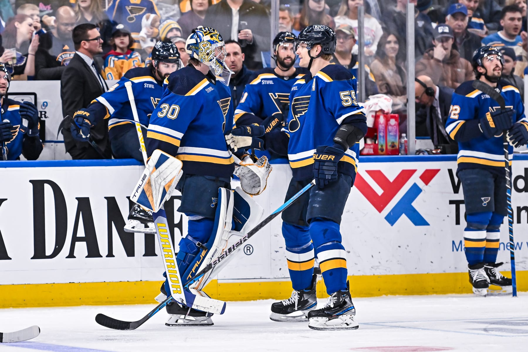 ST. LOUIS, MO - MARCH 19: St. Louis Blues defenseman Colton Parayko (55) pushes St. Louis Blues goaltender Joel Hofer (30) back to the bench after his skate blade broke during a game between the Winnipeg Jets and the St. Louis Blues on March 19 2023, at the Enterprise Center in St. Louis MO (Photo by Rick Ulreich/Icon Sportswire via Getty Images)