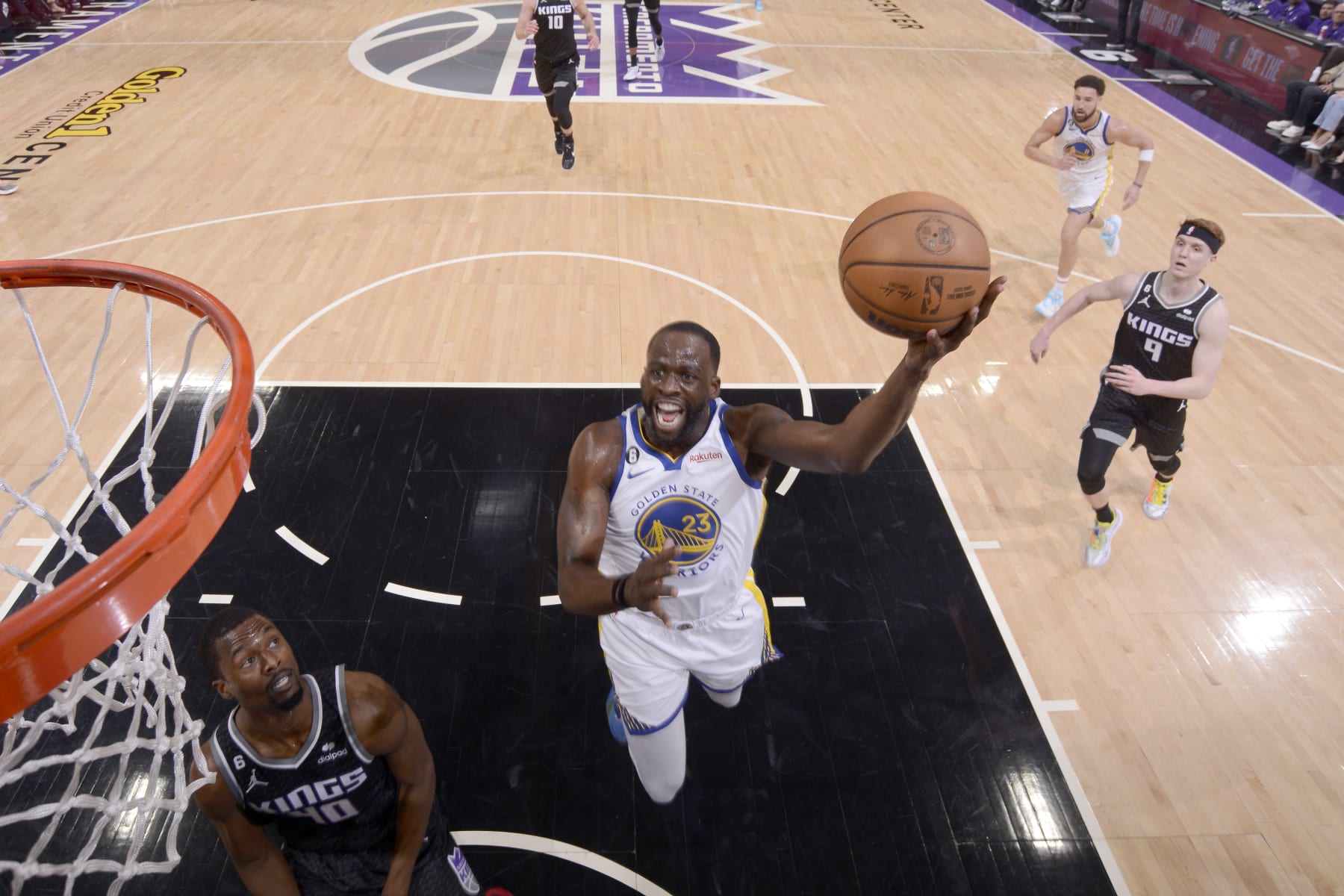 SACRAMENTO, CA - APRIL 17:  Draymond Green #23 of the Golden State Warriors goes to the basket against the Sacramento Kings during Round 1 Game 2 of the 2023 NBA Playoffs on April 17, 2023 at Golden 1 Center in Sacramento, California. NOTE TO USER: User expressly acknowledges and agrees that, by downloading and or using this Photograph, user is consenting to the terms and conditions of the Getty Images License Agreement. Mandatory Copyright Notice: Copyright 2023 NBAE (Photo by Rocky Widner/NBAE via Getty Images)