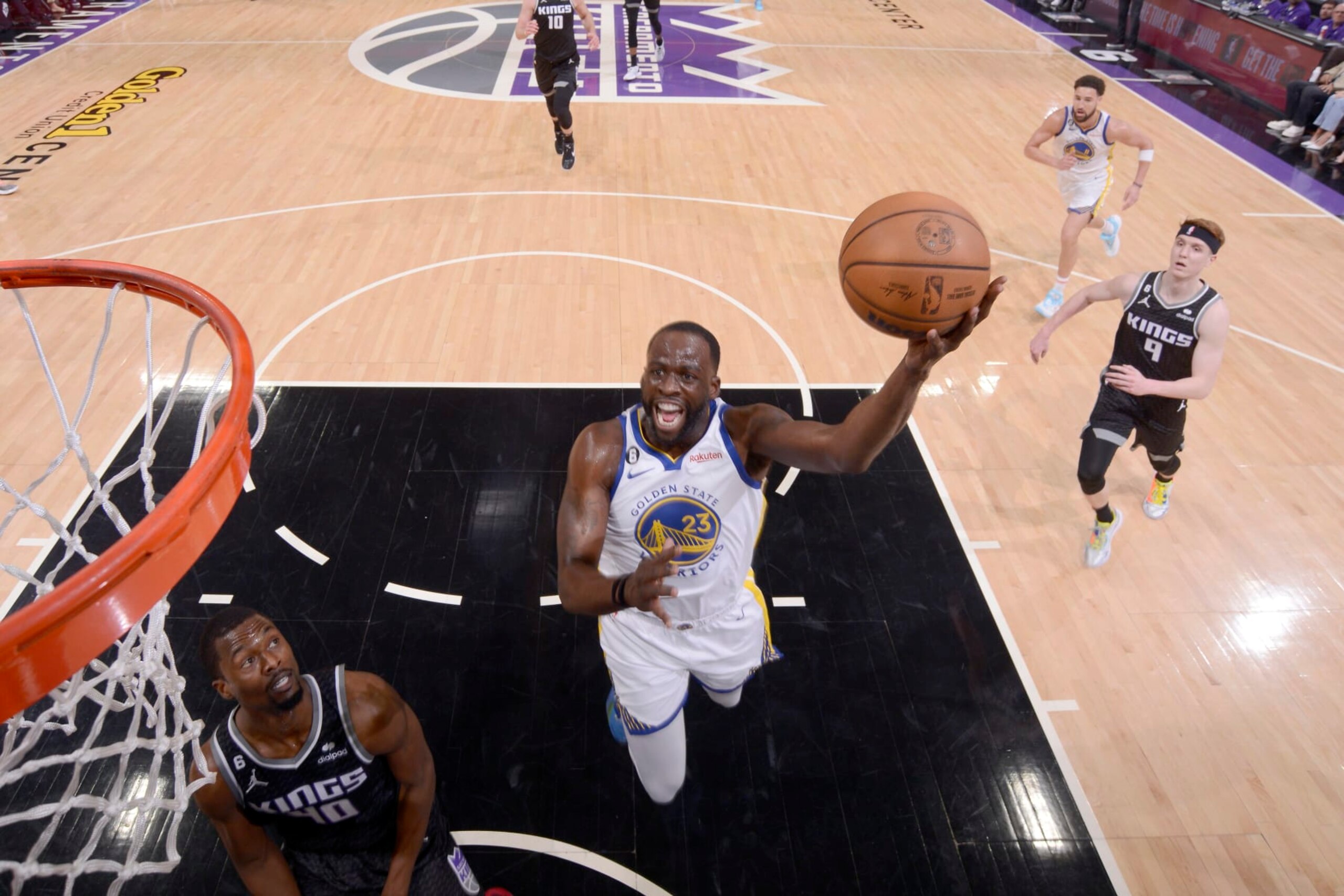 SACRAMENTO, CA - APRIL 17:  Draymond Green #23 of the Golden State Warriors goes to the basket against the Sacramento Kings during Round 1 Game 2 of the 2023 NBA Playoffs on April 17, 2023 at Golden 1 Center in Sacramento, California. NOTE TO USER: User expressly acknowledges and agrees that, by downloading and or using this Photograph, user is consenting to the terms and conditions of the Getty Images License Agreement. Mandatory Copyright Notice: Copyright 2023 NBAE (Photo by Rocky Widner/NBAE via Getty Images)