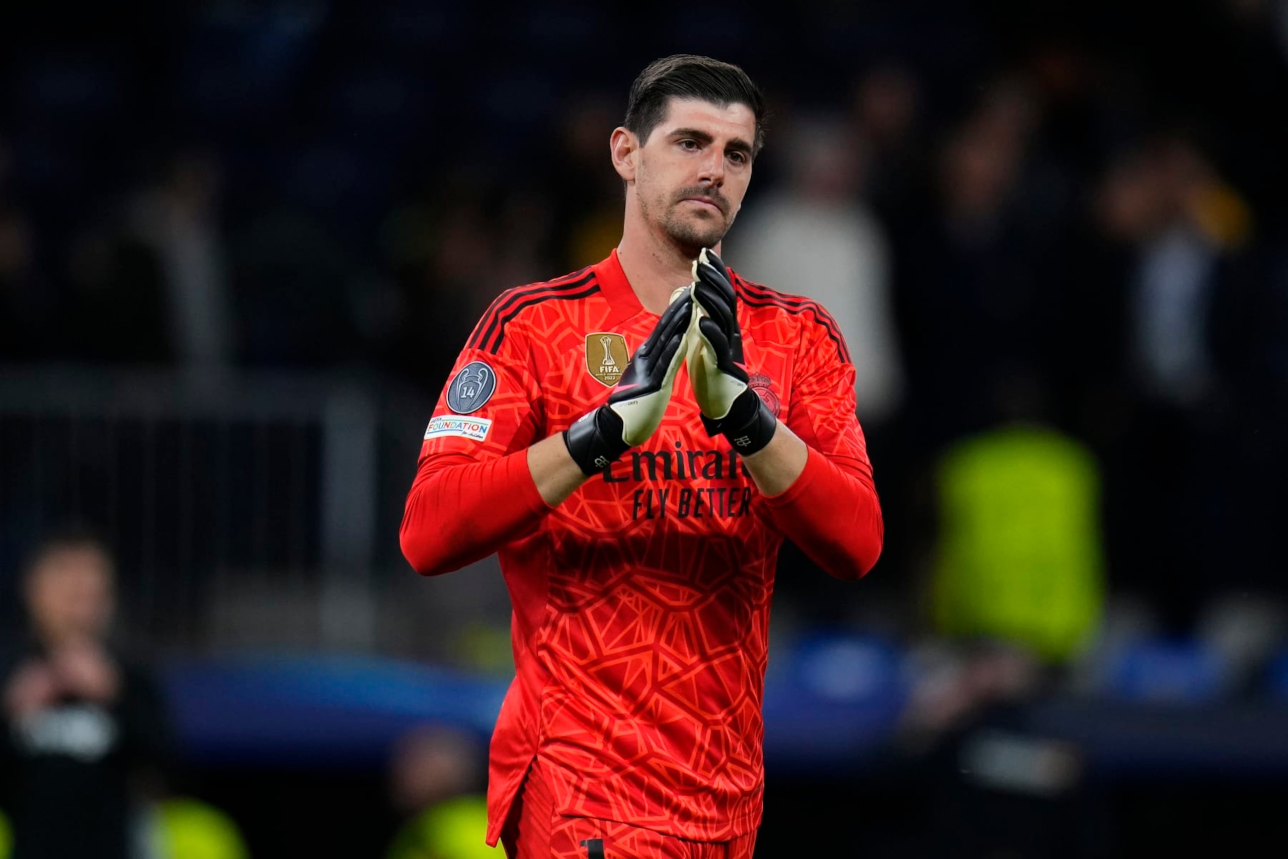 Real Madrid's goalkeeper Thibaut Courtois applauds after the Champions League quarterfinal, first leg, soccer match between Real Madrid and Chelsea at the Santiago Bernabeu stadium in Madrid, Spain, Wednesday, April 12, 2023. Real won 2-0. (AP Photo/Manu Fernandez) Real Madrid's goalkeeper Thibaut Courtois applauds after the Champions League quarterfinal, first leg, soccer match between Real Madrid and Chelsea at the Santiago Bernabeu stadium in Madrid, Spain, Wednesday, April 12, 2023. Real won 2-0. (AP Photo/Manu Fernandez)