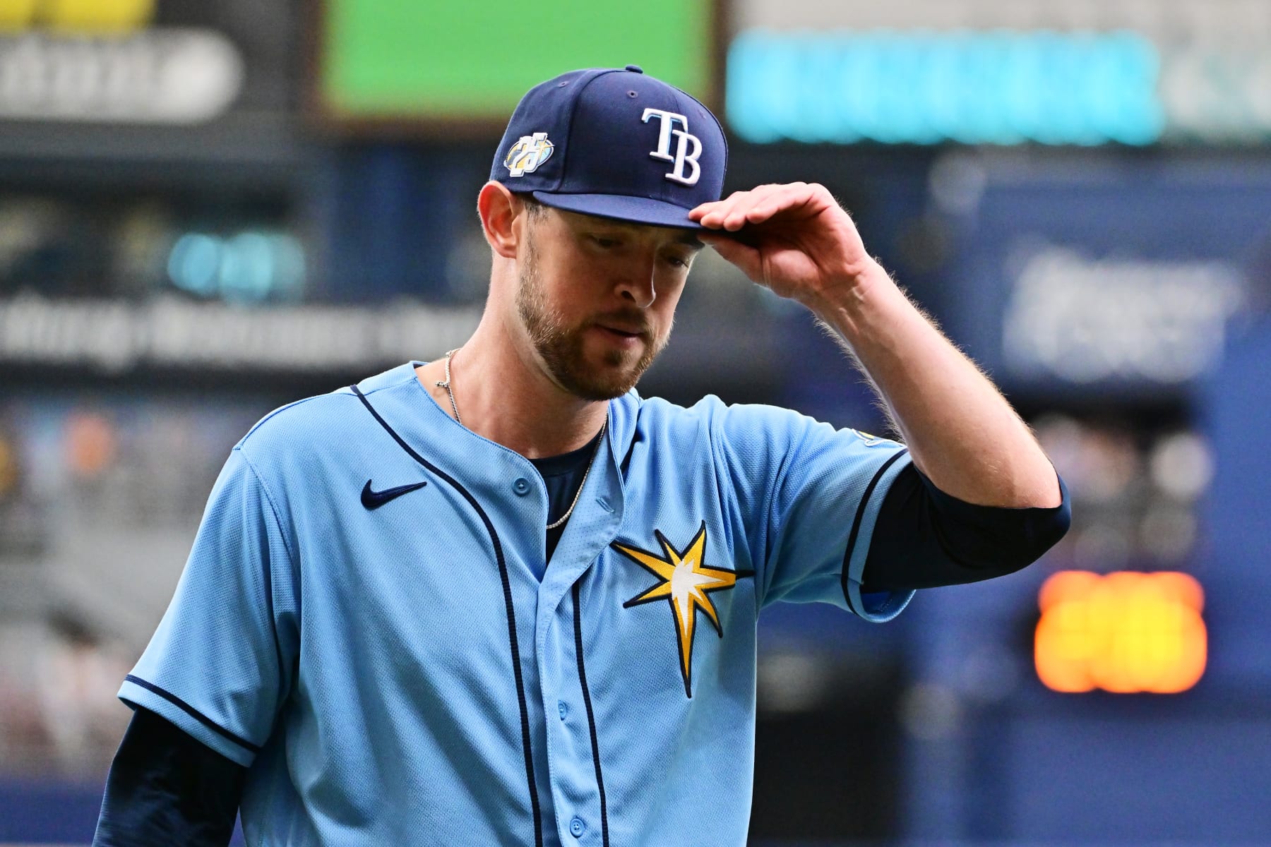 ST PETERSBURG, FLORIDA - APRIL 13: Jeffrey Springs #59 of the Tampa Bay Rays walks off the field in the middle of the third inning against the Boston Red Sox at Tropicana Field on April 13, 2023 in St Petersburg, Florida. (Photo by Julio Aguilar/Getty Images)