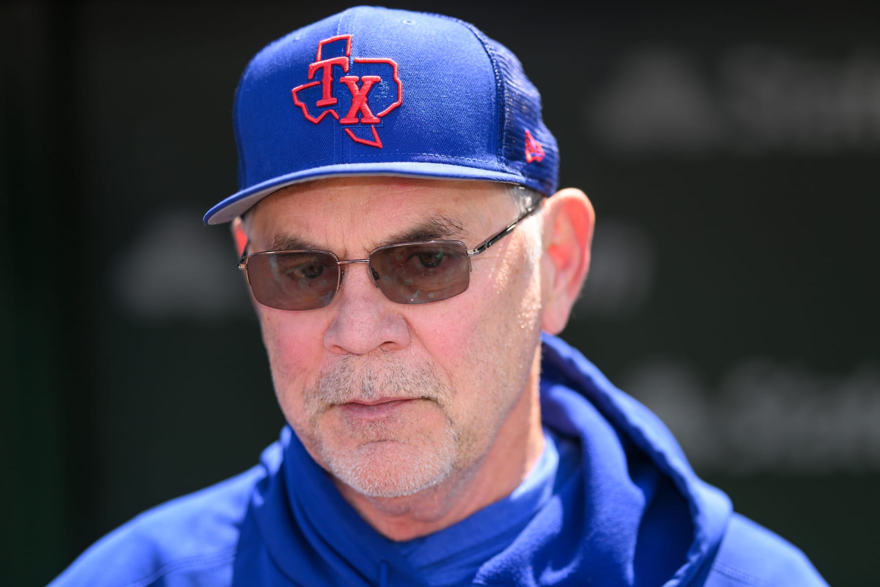 CHICAGO, ILLINOIS - APRIL 08: Texas Rangers manager Bruce Bocky looks on before the game against the Chicago Cubs at Wrigley Field on April 08, 2023 in Chicago, Illinois. (Photo by Quinn Harris/Getty Images)