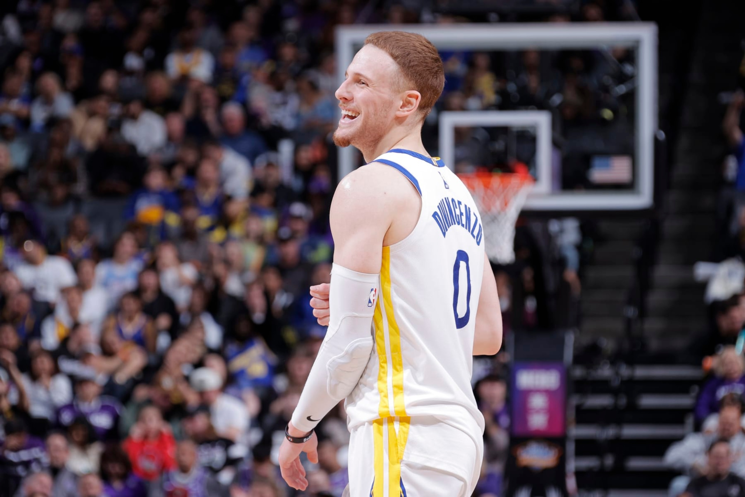 SACRAMENTO, CA - APRIL 7: Donte DiVincenzo #0 of the Golden State Warriors smiles during the game against the Sacramento Kings on April 7, 2023 at Golden 1 Center in Sacramento, California. NOTE TO USER: User expressly acknowledges and agrees that, by downloading and or using this Photograph, user is consenting to the terms and conditions of the Getty Images License Agreement. Mandatory Copyright Notice: Copyright 2023 NBAE (Photo by Rocky Widner/NBAE via Getty Images)