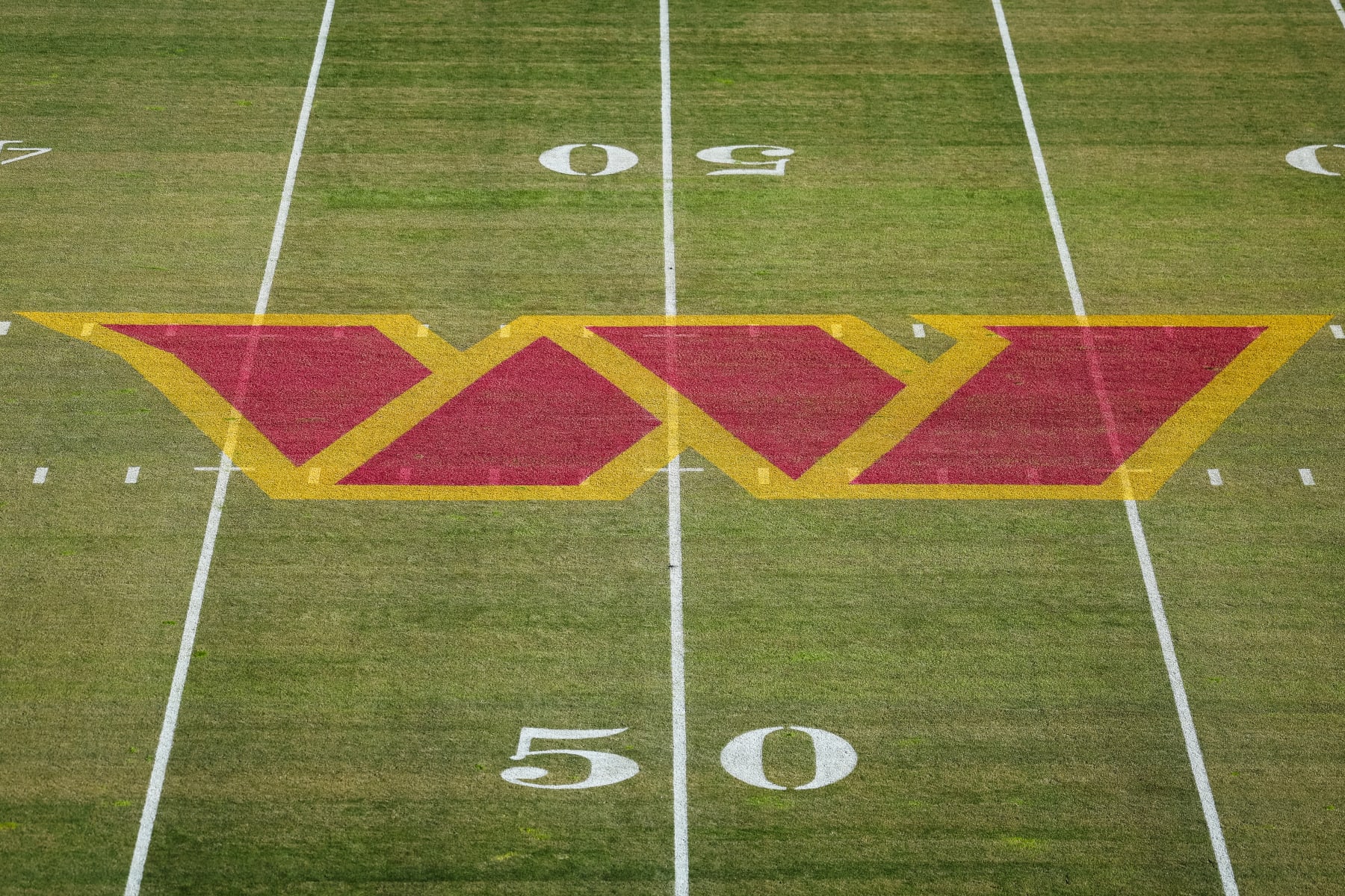 LANDOVER, MD - JANUARY 01: A general view of the Washington Commanders logo on the field before the game between the Washington Commanders and the Cleveland Browns at FedExField on January 1, 2023 in Landover, Maryland. (Photo by Scott Taetsch/Getty Images)