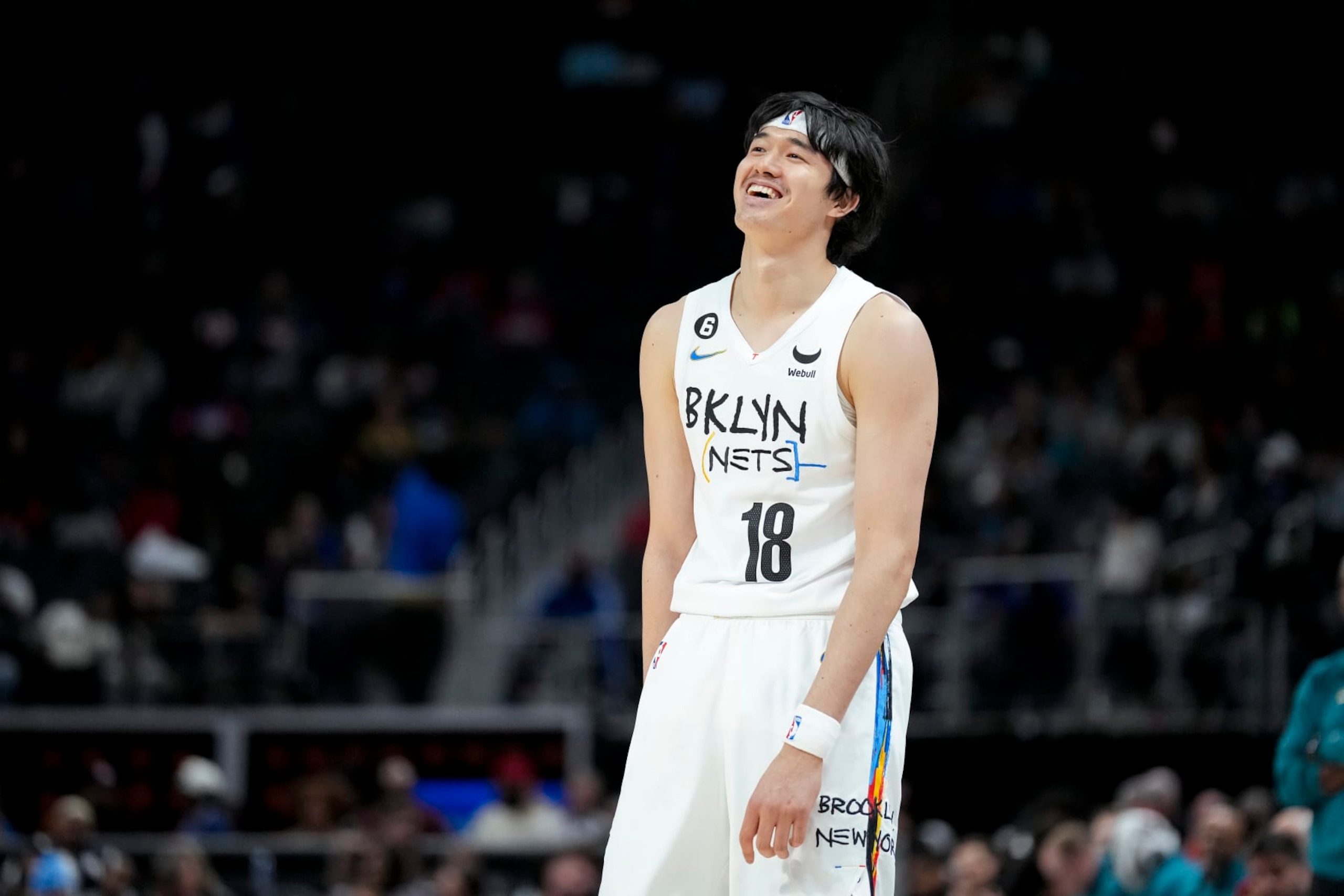 DETROIT, MICHIGAN - APRIL 05: Yuta Watanabe #18 of the Brooklyn Nets looks on and smiles against the Detroit Pistons at Little Caesars Arena on April 05, 2023 in Detroit, Michigan. NOTE TO USER: User expressly acknowledges and agrees that, by downloading and or using this photograph, User is consenting to the terms and conditions of the Getty Images License Agreement. (Photo by Nic Antaya/Getty Images) DETROIT, MICHIGAN - APRIL 05: Yuta Watanabe #18 of the Brooklyn Nets looks on and smiles against the Detroit Pistons at Little Caesars Arena on April 05, 2023 in Detroit, Michigan. NOTE TO USER: User expressly acknowledges and agrees that, by downloading and or using this photograph, User is consenting to the terms and conditions of the Getty Images License Agreement. (Photo by Nic Antaya/Getty Images)
