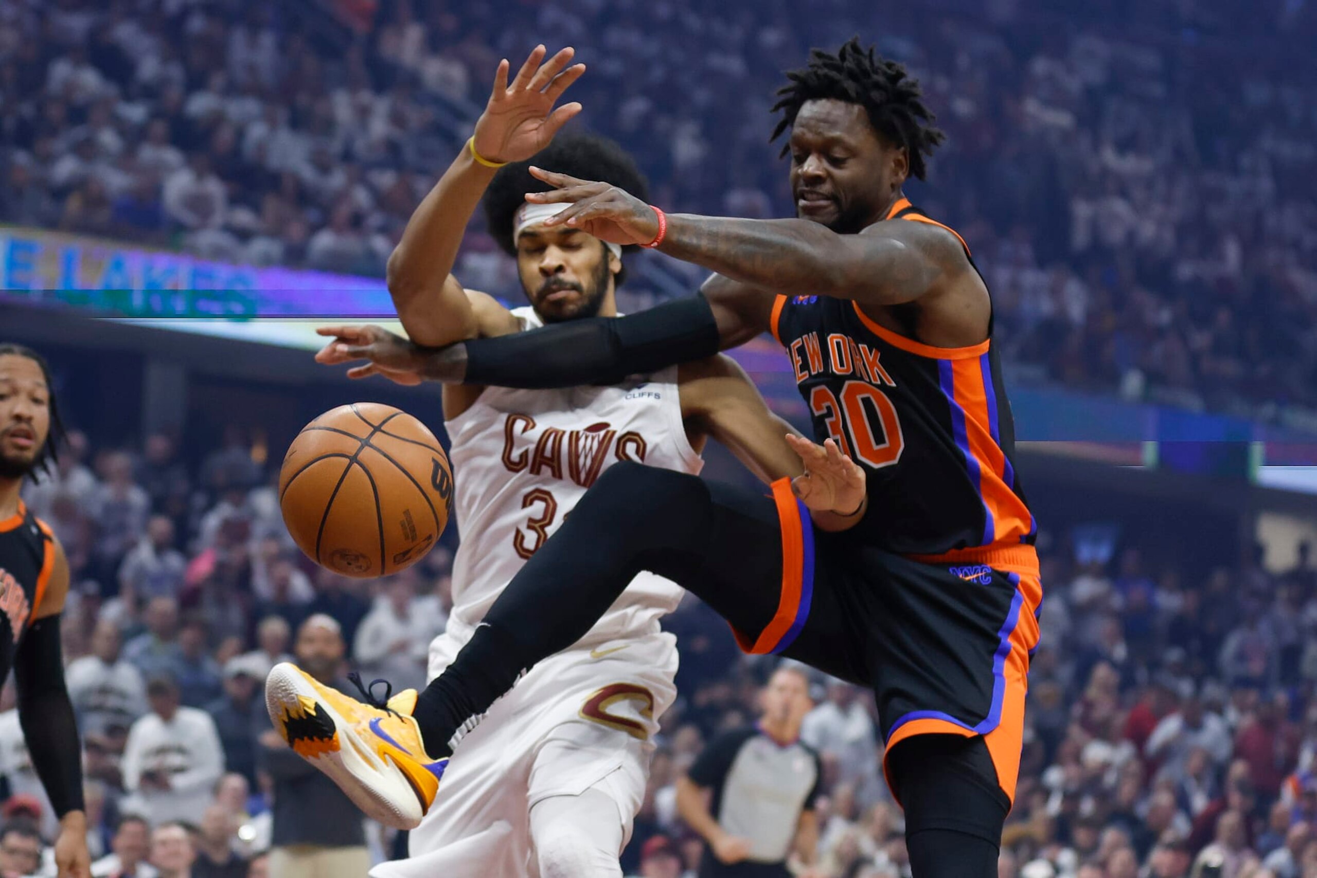 New York Knicks forward Julius Randle (30) and Cleveland Cavaliers center Jarrett Allen go for a rebound during the first half of Game 2 of an NBA basketball first-round playoff series Tuesday, April 18, 2023, in Cleveland. (AP Photo/Ron Schwane) New York Knicks forward Julius Randle (30) and Cleveland Cavaliers center Jarrett Allen go for a rebound during the first half of Game 2 of an NBA basketball first-round playoff series Tuesday, April 18, 2023, in Cleveland. (AP Photo/Ron Schwane)