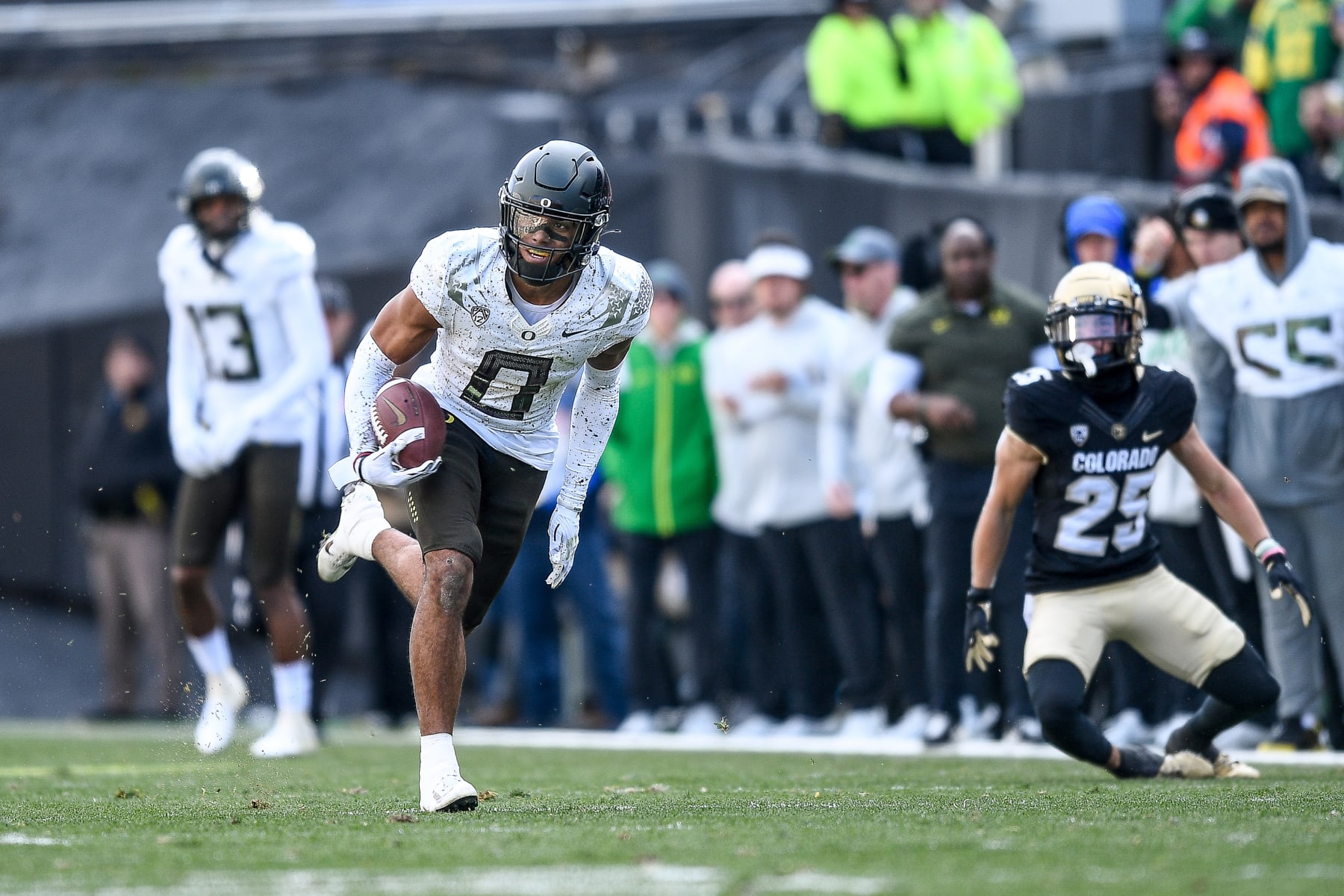 BOULDER, CO - NOVEMBER 5:  Defensive back Christian Gonzalez #0 of the Oregon Ducks returns an interception in the third quarter of a game against the Colorado Buffaloes at Folsom Field on November 5, 2022 in Boulder, Colorado. (Photo by Dustin Bradford/Getty Images)