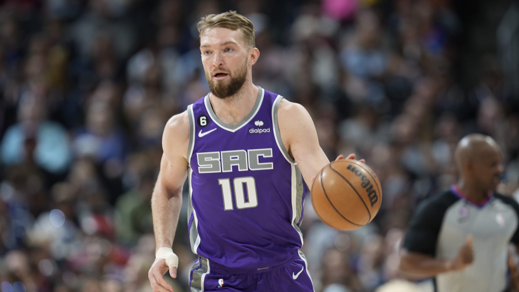 Sacramento Kings forward Domantas Sabonis (10) in the first half of an NBA basketball game Sunday, April 9, 2023, in Denver. (AP Photo/David Zalubowski)