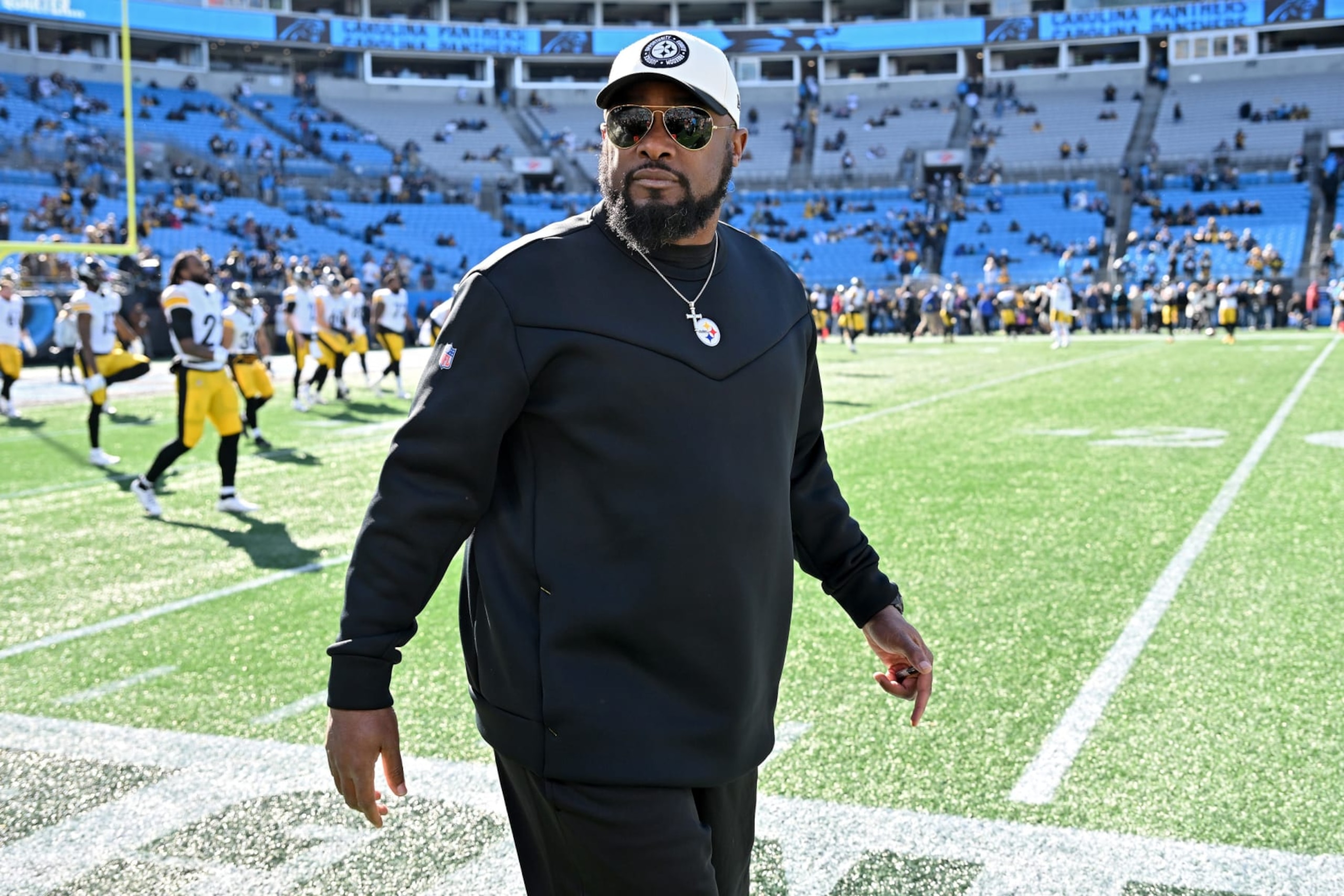 CHARLOTTE, NORTH CAROLINA - DECEMBER 18: Head coach Mike Tomlin of the Pittsburgh Steelers looks on prior to a game against the Carolina Panthers at Bank of America Stadium on December 18, 2022 in Charlotte, North Carolina. (Photo by Grant Halverson/Getty Images) CHARLOTTE, NORTH CAROLINA - DECEMBER 18: Head coach Mike Tomlin of the Pittsburgh Steelers looks on prior to a game against the Carolina Panthers at Bank of America Stadium on December 18, 2022 in Charlotte, North Carolina. (Photo by Grant Halverson/Getty Images)
