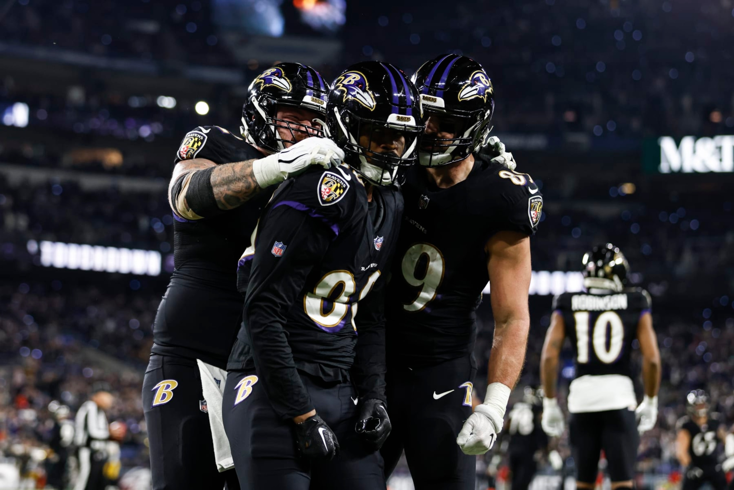 BALTIMORE, MARYLAND - JANUARY 01: Isaiah Likely #80 of the Baltimore Ravens celebrates with his teammates Ben Powers #72 of the Baltimore Ravens and Mark Andrews #89 of the Baltimore Ravens after scoring a touchdown during an NFL football game between the Baltimore Ravens and the Pittsburgh Steelers at M&T Bank Stadium on January 01, 2023 in Baltimore, Maryland. (Photo by Michael Owens/Getty Images) BALTIMORE, MARYLAND - JANUARY 01: Isaiah Likely #80 of the Baltimore Ravens celebrates with his teammates Ben Powers #72 of the Baltimore Ravens and Mark Andrews #89 of the Baltimore Ravens after scoring a touchdown during an NFL football game between the Baltimore Ravens and the Pittsburgh Steelers at M&T Bank Stadium on January 01, 2023 in Baltimore, Maryland. (Photo by Michael Owens/Getty Images)