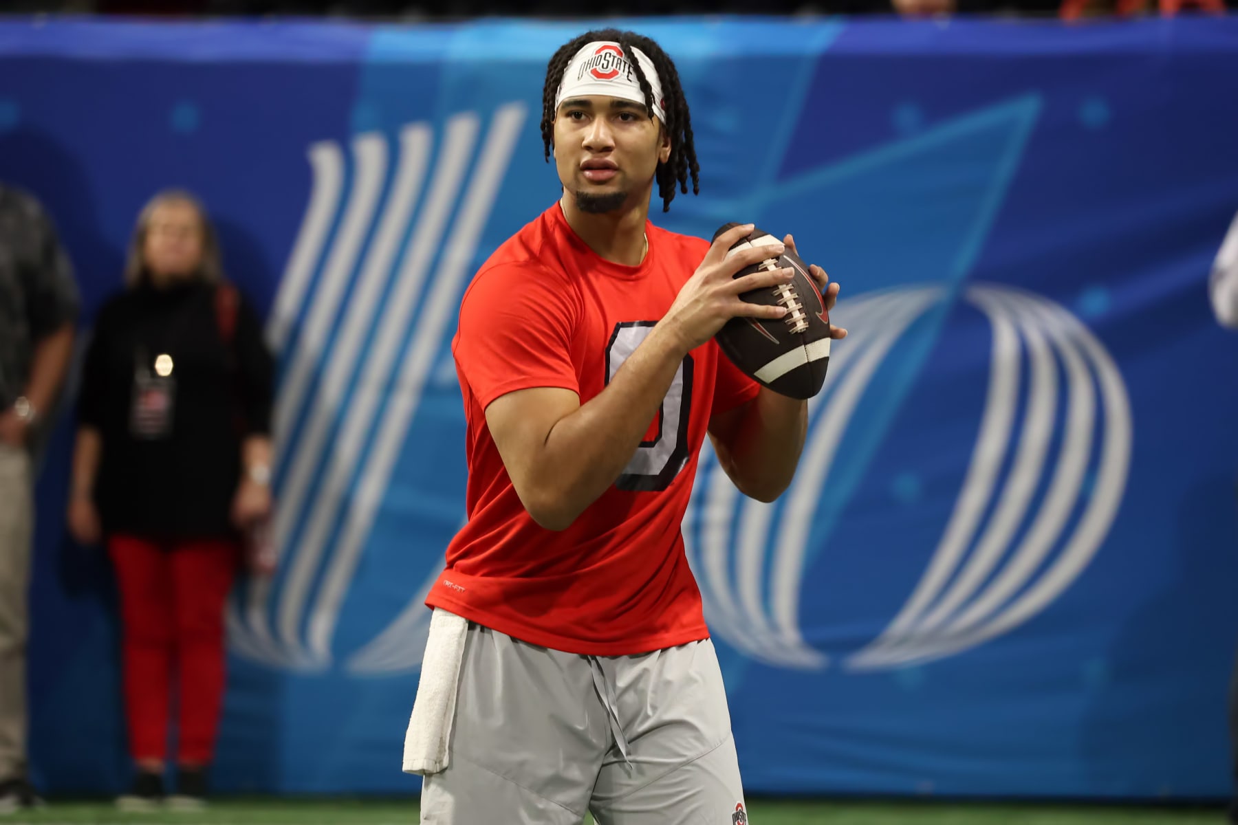 ATLANTA, GA - DECEMBER 31:  Ohio State Buckeyes quarterback C.J. Stroud (7) warms up for the college football Playoff Semifinal game at the Chick-fil-a Peach Bowl between the Georgia Bulldogs and the Ohio State Buckeyes on December 31, 2022 at Mercedes-Benz Stadium in Atlanta, Georgia.  (Photo by Michael Wade/Icon Sportswire via Getty Images)