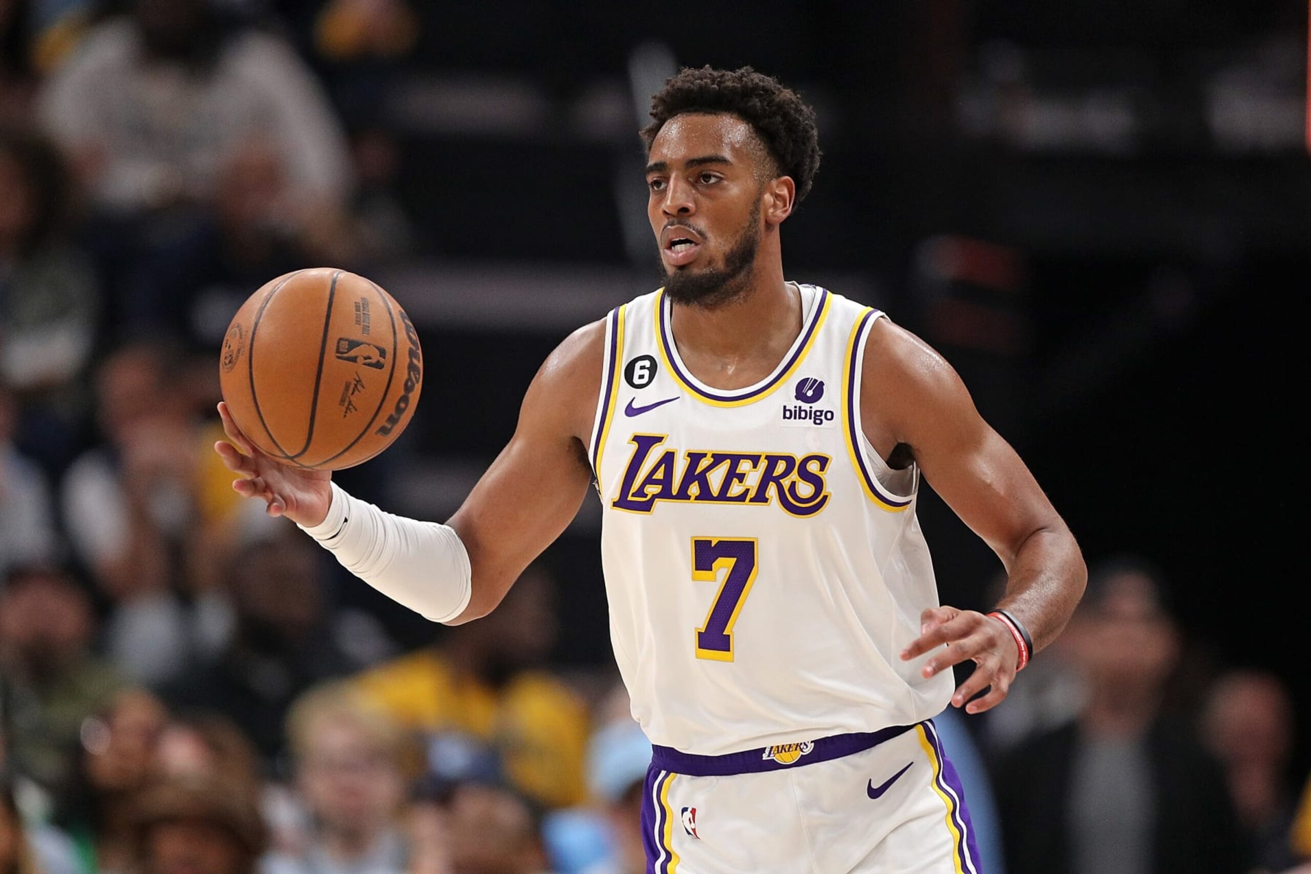 MEMPHIS, TENNESSEE - APRIL 16: Troy Brown Jr. #7 of the Los Angeles Lakers brings the ball up court during the game against the Memphis Grizzlies during Game One of the Western Conference First Round Playoffs at FedExForum on April 16, 2023 in Memphis, Tennessee. NOTE TO USER: User expressly acknowledges and agrees that, by downloading and or using this photograph, User is consenting to the terms and conditions of the Getty Images License Agreement. (Photo by Justin Ford/Getty Images) MEMPHIS, TENNESSEE - APRIL 16: Troy Brown Jr. #7 of the Los Angeles Lakers brings the ball up court during the game against the Memphis Grizzlies during Game One of the Western Conference First Round Playoffs at FedExForum on April 16, 2023 in Memphis, Tennessee. NOTE TO USER: User expressly acknowledges and agrees that, by downloading and or using this photograph, User is consenting to the terms and conditions of the Getty Images License Agreement. (Photo by Justin Ford/Getty Images)