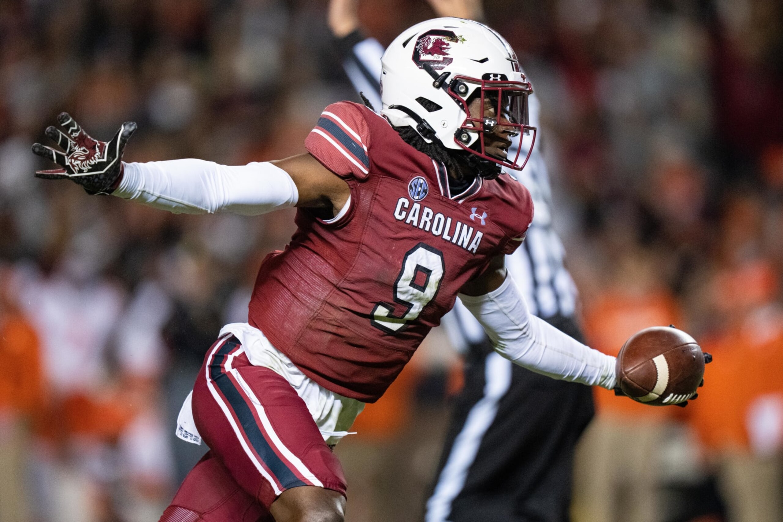 COLUMBIA, SOUTH CAROLINA - NOVEMBER 27: Defensive back Cam Smith #9 of the South Carolina Gamecocks celebrates after making an interception against the Clemson Tigers during their game at Williams-Brice Stadium on November 27, 2021 in Columbia, South Carolina. (Photo by Jacob Kupferman/Getty Images)