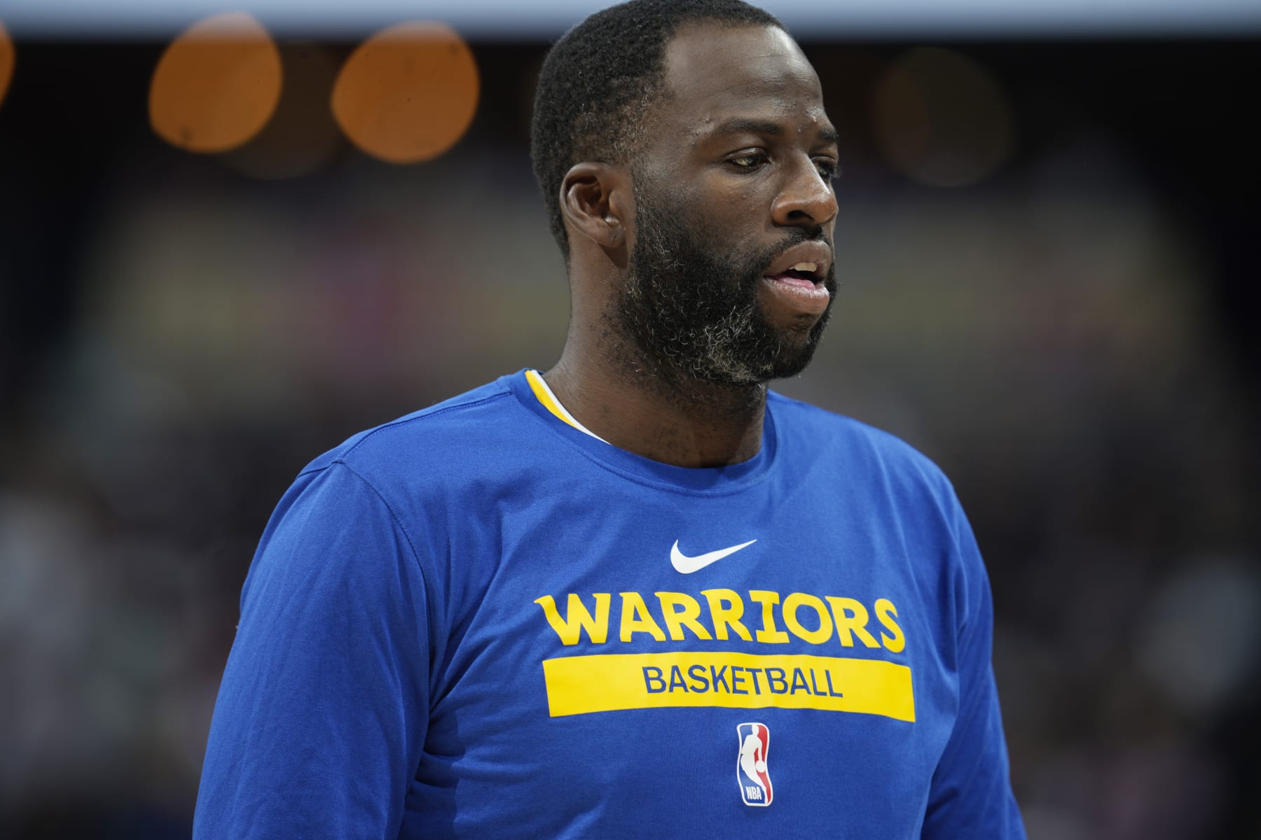 Golden State Warriors forward Draymond Green (23) in the second half of an NBA basketball game Sunday, April 2, 2023, in Denver. (AP Photo/David Zalubowski)