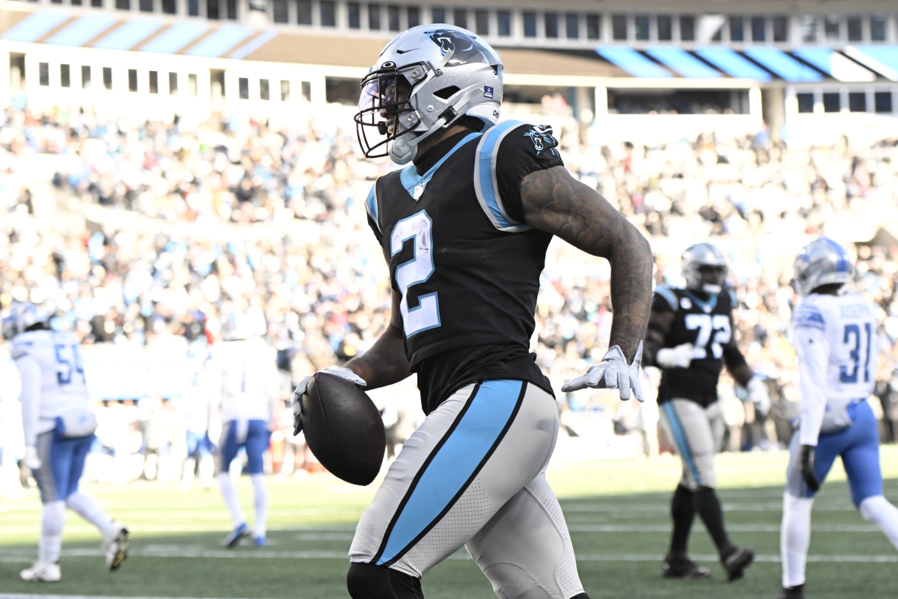 CHARLOTTE, NORTH CAROLINA - DECEMBER 24: DJ Moore #2 of the Carolina Panthers celebrates after scoring a touchdown  against the Detroit Lions during the third quarter of the game at Bank of America Stadium on December 24, 2022 in Charlotte, North Carolina. (Photo by Eakin Howard/Getty Images)