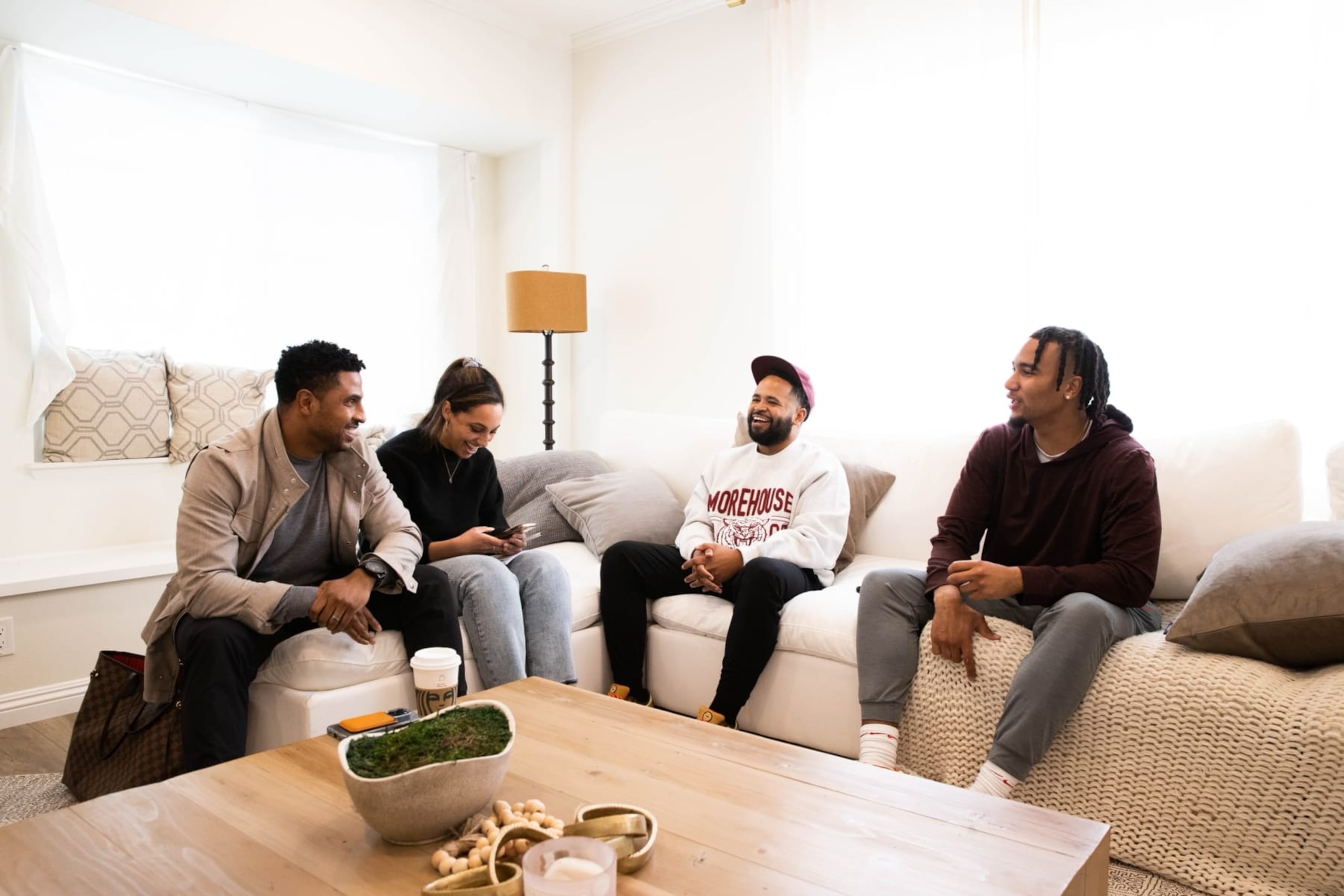Lockerverse founders Carlos McFall (left) and Trey McDonald, and NFL prospect C.J. Stroud (in conversation with B/R's Drew Jones, second from left) see the company as an ideal platform for fans, brands and athletes.