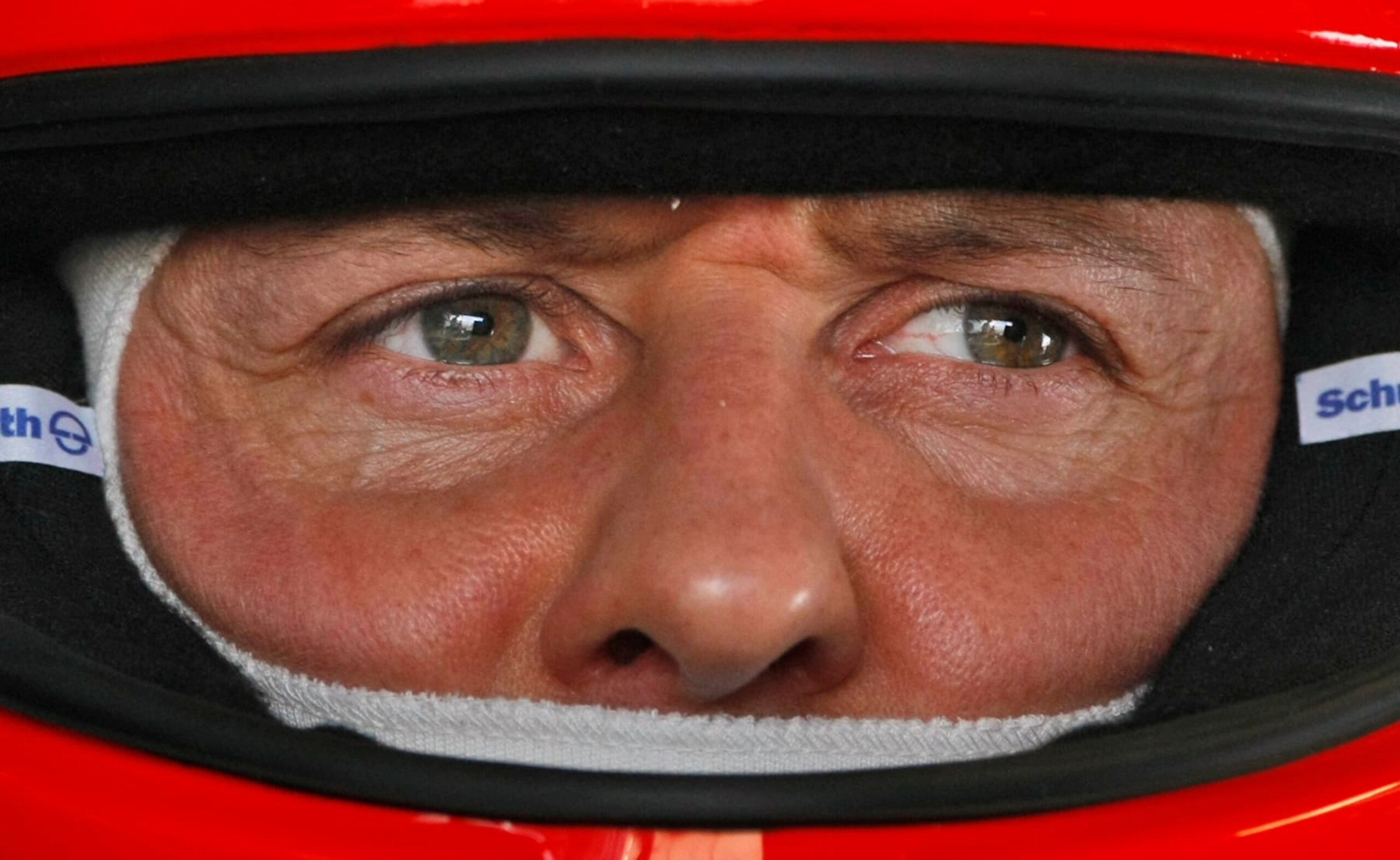 FILE - In this March 12, 2010 file photo Mercedes Grand Prix driver Michael Schumacher of Germany is pictured in the pits during the first practice session at the Formula One Bahrain International Circuit in Sakhir, Bahrain. A Paris newspaper says seven-time Formula One world champion Michael Schumacher is being treated with a cutting-edge stem-cell therapy in one of the French capital's hospitals. (AP Photo/Ben Curtis, File)