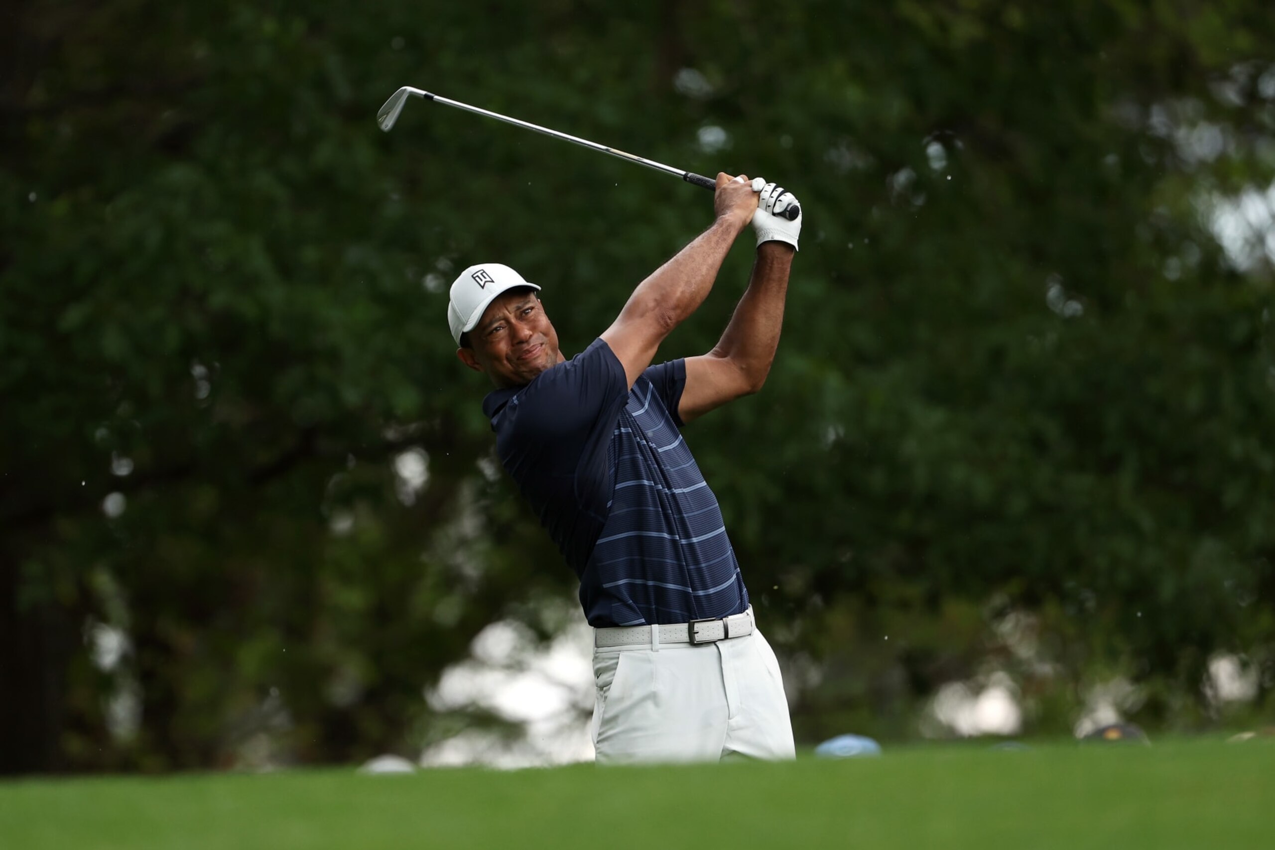 AUGUSTA, GEORGIA - APRIL 07: Tiger Woods of the United States plays his shot from the fourth tee during the second round of the 2023 Masters Tournament at Augusta National Golf Club on April 07, 2023 in Augusta, Georgia. (Photo by Patrick Smith/Getty Images)