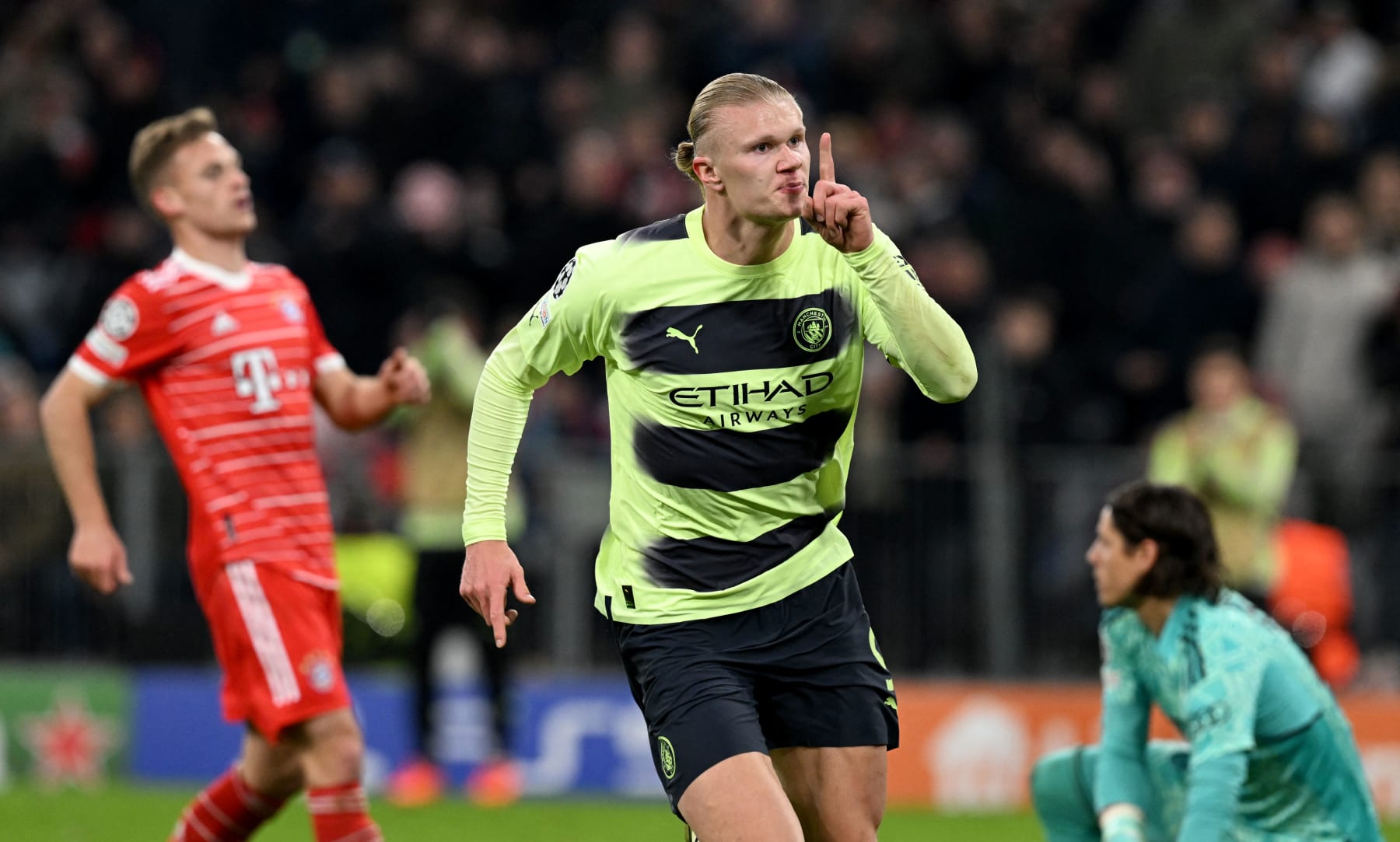 Manchester City's Norwegian striker Erling Haaland celebrates after scoring the 0-1 opening goal during the UEFA Champions League quarter-final, second leg football match between Bayern Munich and Manchester City in Munich, southern Germany on April 19, 2023. (Photo by CHRISTOF STACHE / AFP) (Photo by CHRISTOF STACHE/AFP via Getty Images)