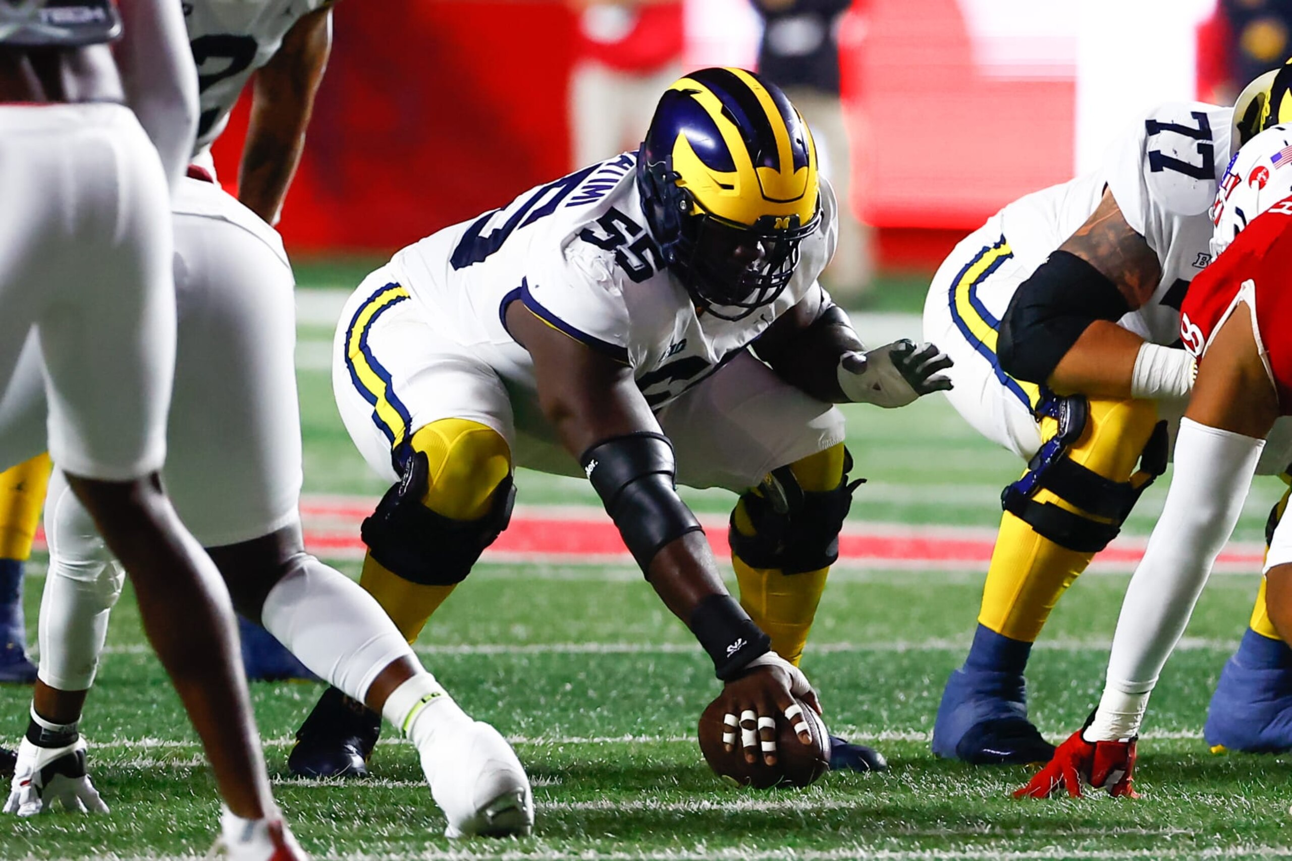 PISCATAWAY, NJ - NOVEMBER 05:  Michigan Wolverines offensive lineman Olusegun Oluwatimi (55) during the college football game against the Rutgers Scarlet Knights on November 5, 2022 at SHI Stadium in Piscataway, New Jersey.  (Photo by Rich Graessle/Icon Sportswire via Getty Images)