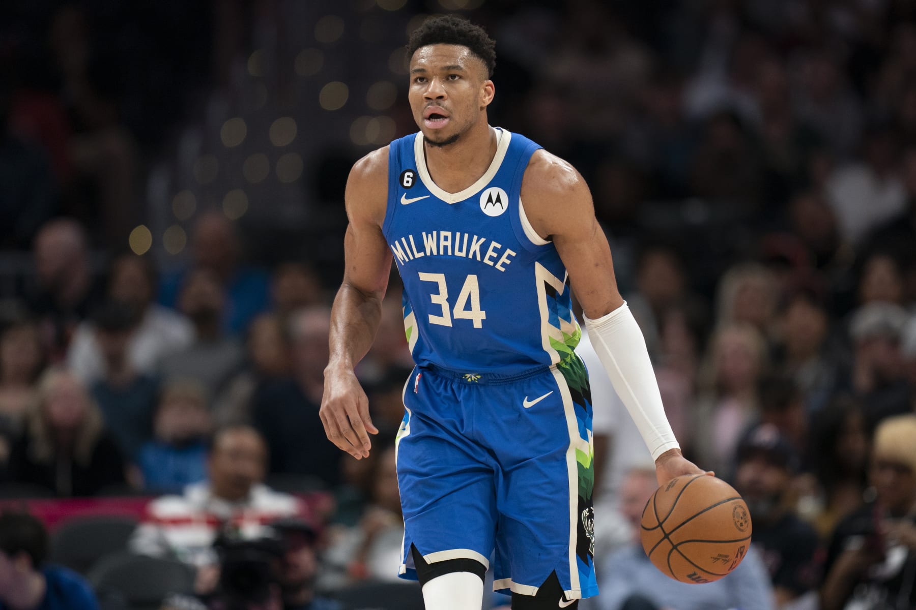 Milwaukee Bucks forward Giannis Antetokounmpo (34) dribbles during the first half of an NBA basketball game against the Washington Wizards, Tuesday, April 4, 2023, in Washington. (AP Photo/Jess Rapfogel)