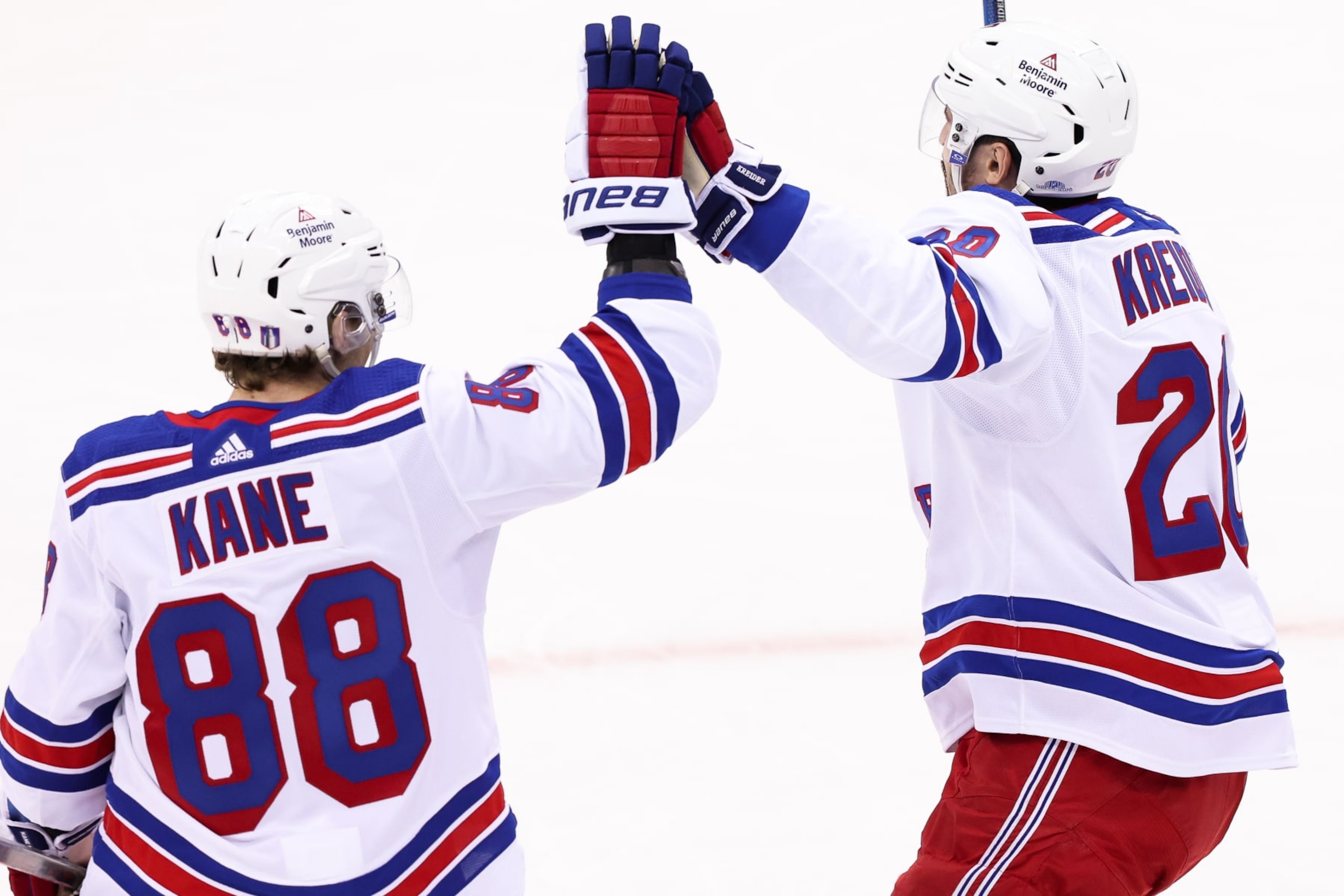 NEWARK, NJ - APRIL 18: New York Rangers left wing Chris Kreider (20) celebrates with New York Rangers right wing Patrick Kane (88) after scoring a goal during the National Hockey League game between the New York Rangers and the New Jersey Devils on April 18, 2023 at Prudential Center in Newark, NJ. (Photo by Andrew Mordzynski/Icon Sportswire via Getty Images)