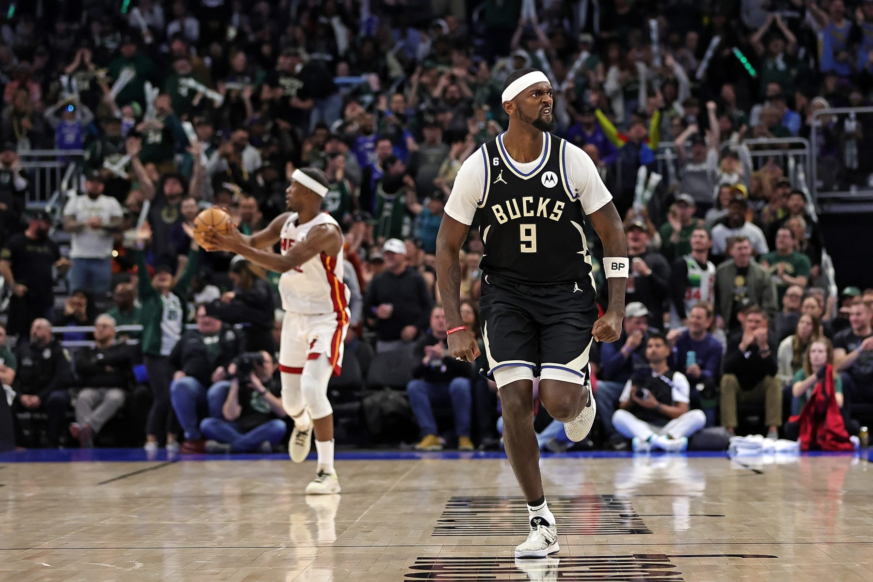 MILWAUKEE, WISCONSIN - APRIL 16: Bobby Portis #9 of the Milwaukee Bucks reacts to a three point shot during Game One of the Eastern Conference First Round Playoffs against the Miami Heat at Fiserv Forum on April 16, 2023 in Milwaukee, Wisconsin. Miami defeated Milwaukee 130-117. NOTE TO USER: User expressly acknowledges and agrees that, by downloading and or using this photograph, User is consenting to the terms and conditions of the Getty Images License Agreement. (Photo by Stacy Revere/Getty Images)