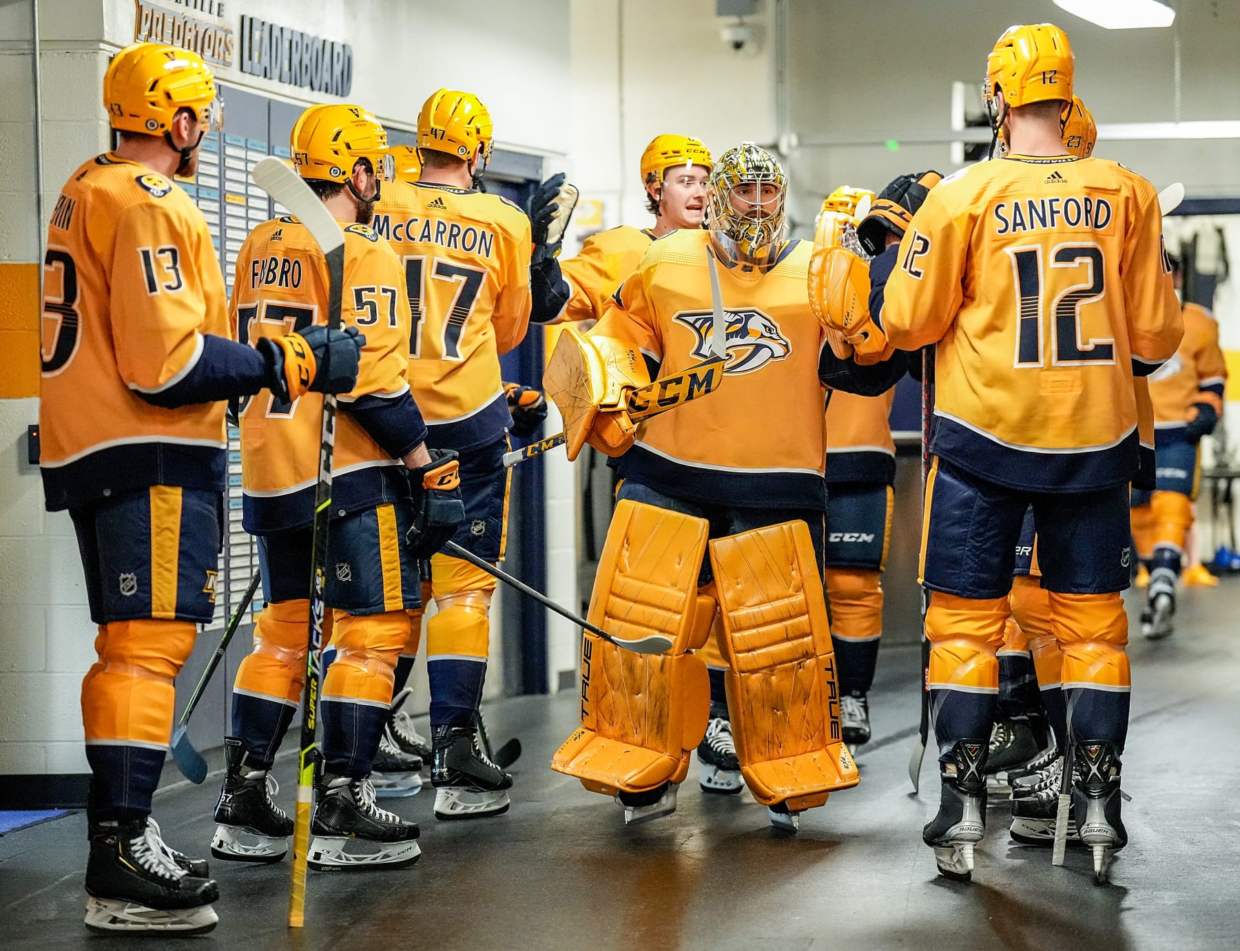NASHVILLE, TENNESSEE - APRIL 13: Juuse Saros #74 of the Nashville Predators leads the team to the ice for an NHL game against the Minnesota Wild at Bridgestone Arena on April 13, 2023 in Nashville, Tennessee. (Photo by John Russell/NHLI via Getty Images)