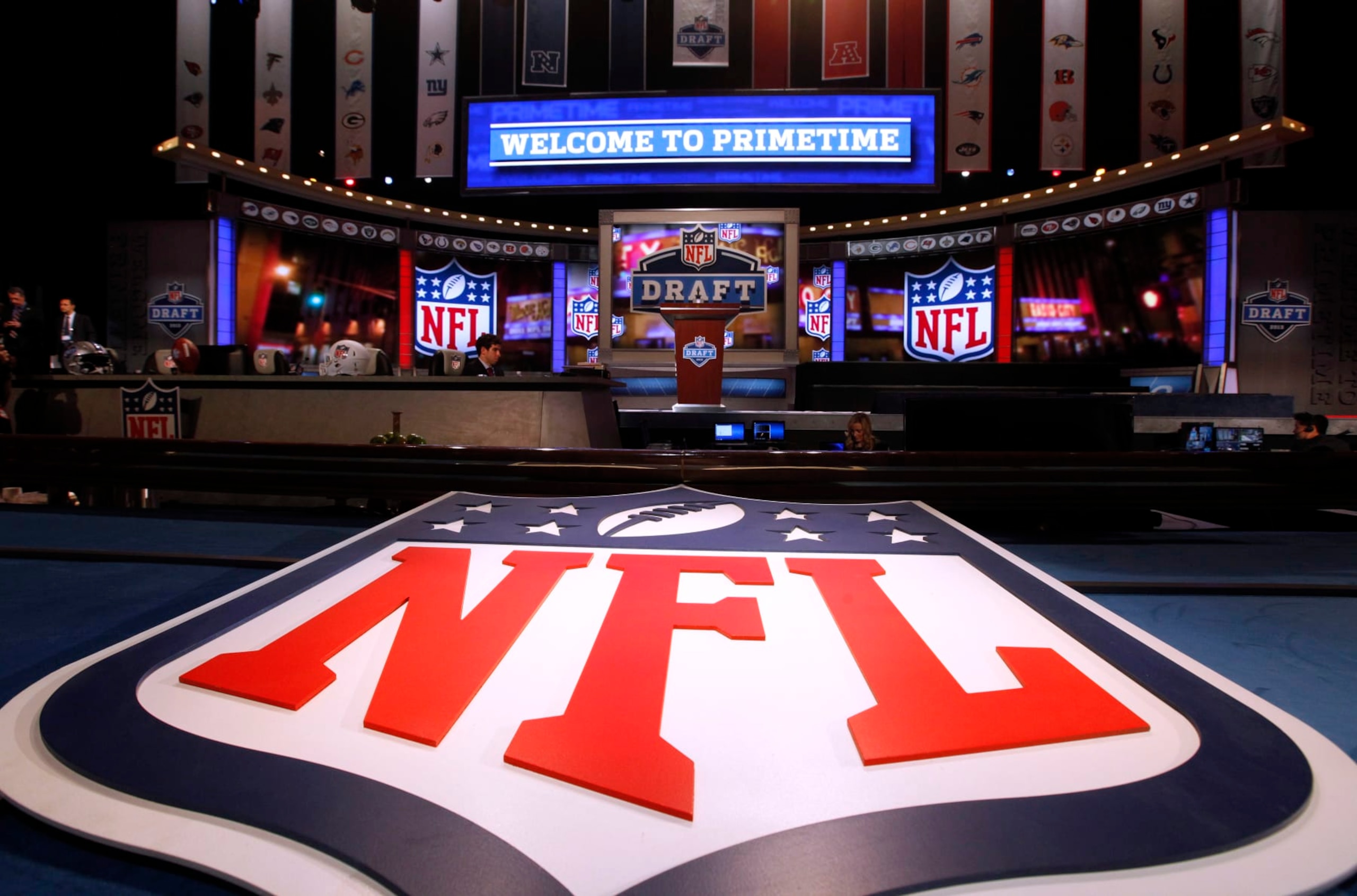 A large NFL logo decorates the stage before the first round of the NFL football draft at Radio City Music Hall, Thursday, April 25, 2013, in New York. (AP Photo/Jason DeCrow)