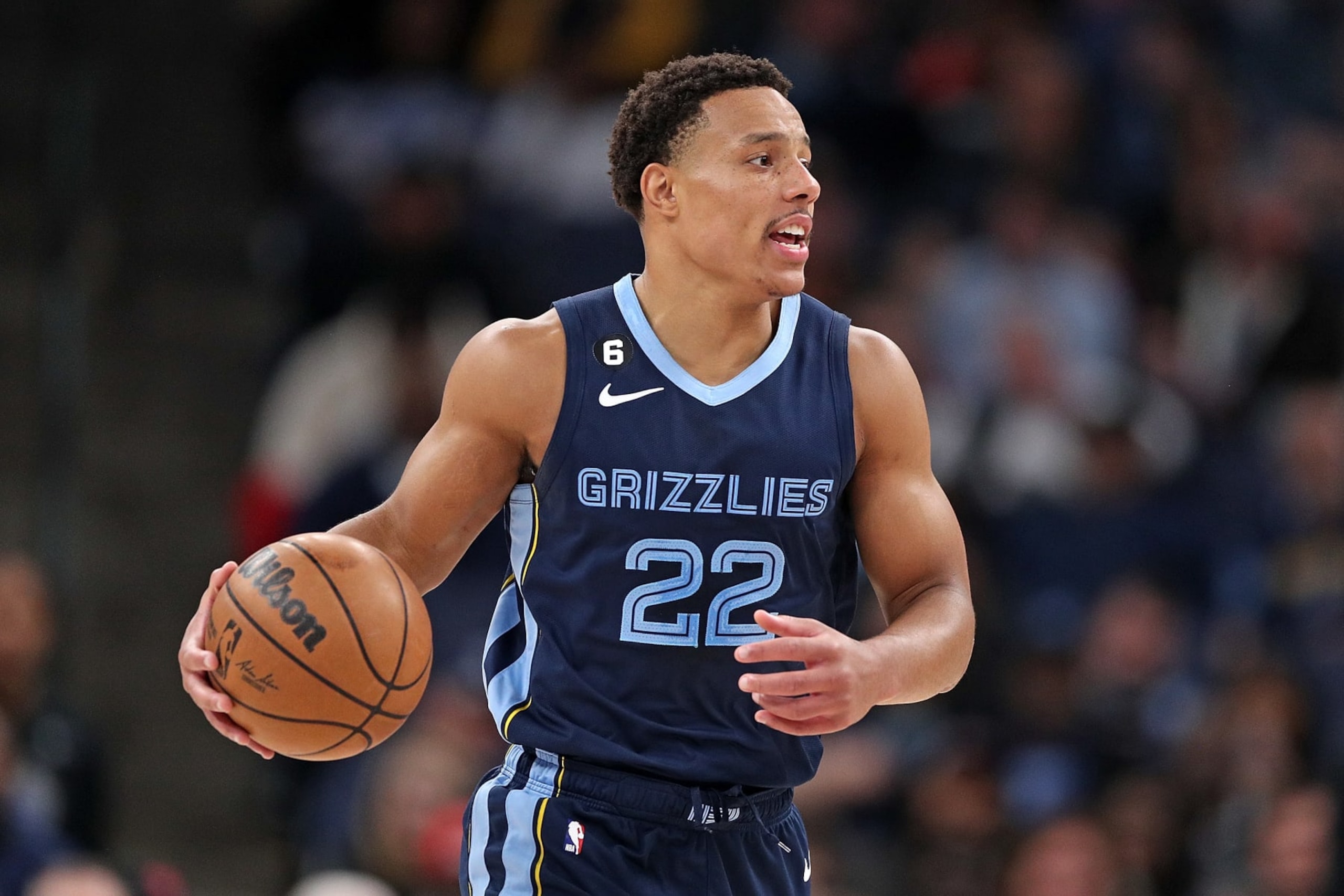 MEMPHIS, TENNESSEE - MARCH 28: Desmond Bane #22 of the Memphis Grizzlies brings the ball up court during the game against the Orlando Magic at FedExForum on March 28, 2023 in Memphis, Tennessee. NOTE TO USER: User expressly acknowledges and agrees that, by downloading and or using this photograph, User is consenting to the terms and conditions of the Getty Images License Agreement. (Photo by Justin Ford/Getty Images) MEMPHIS, TENNESSEE - MARCH 28: Desmond Bane #22 of the Memphis Grizzlies brings the ball up court during the game against the Orlando Magic at FedExForum on March 28, 2023 in Memphis, Tennessee. NOTE TO USER: User expressly acknowledges and agrees that, by downloading and or using this photograph, User is consenting to the terms and conditions of the Getty Images License Agreement. (Photo by Justin Ford/Getty Images)