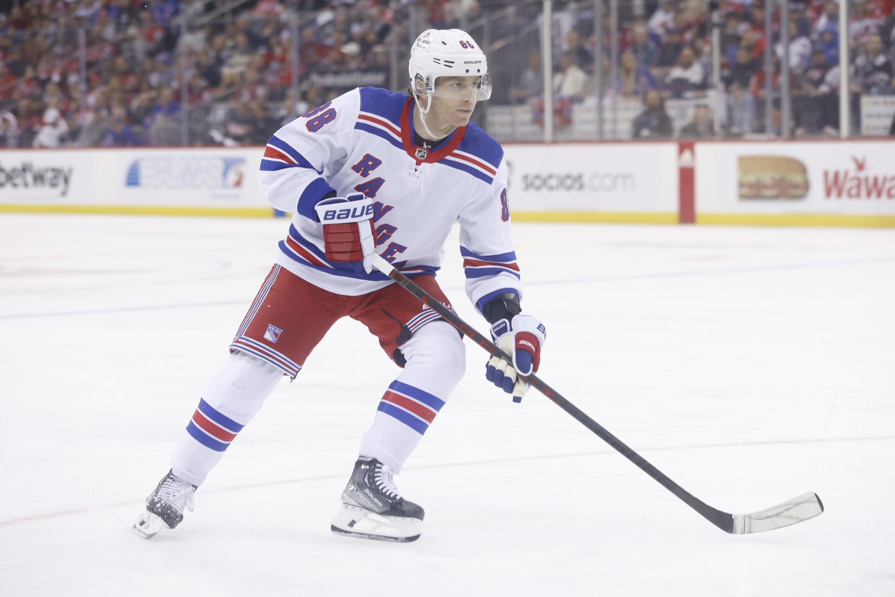 NEWARK, NEW JERSEY - APRIL 18: Patrick Kane #88 of the New York Rangers skates against the New Jersey Devils during the second period in Game One of the First Round of the 2023 Stanley Cup Playoffs at Prudential Center on April 18, 2023 in Newark, New Jersey. (Photo by Josh Lobel/NHLI via Getty Images)