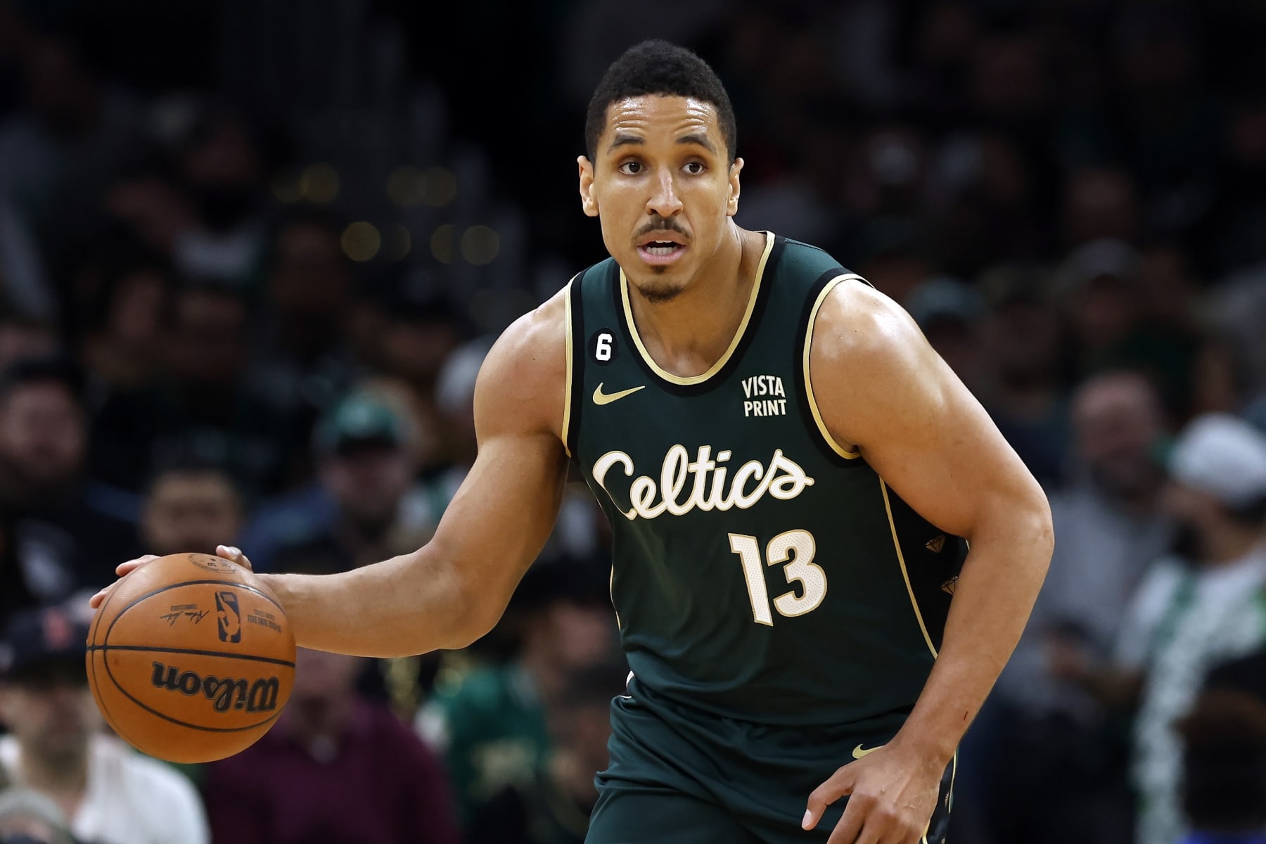 Boston Celtics' Malcolm Brogdon plays against the Atlanta Hawks in the first half during Game 1 in the first round of the NBA basketball playoffs, Saturday, April 15, 2023, in Boston. (AP Photo/Michael Dwyer)