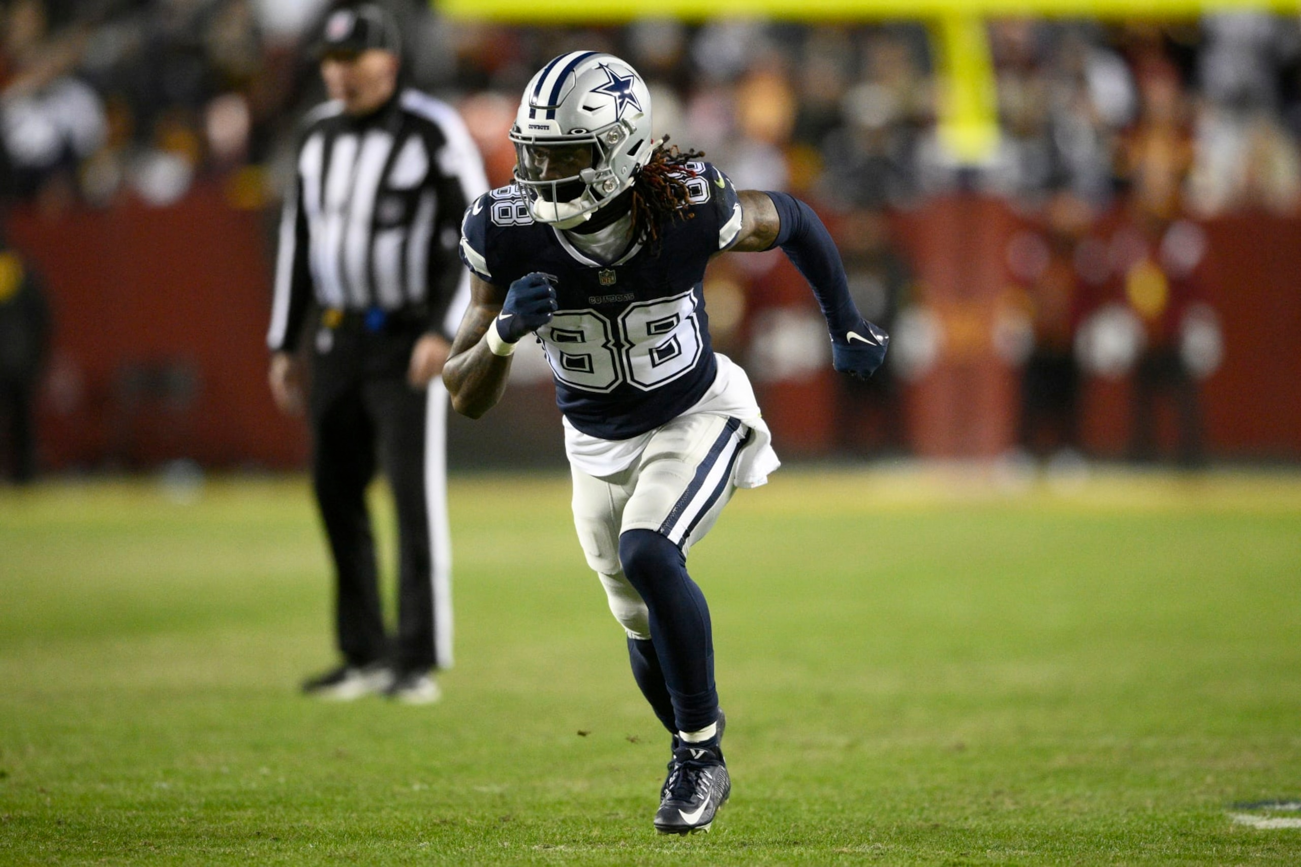 Dallas Cowboys wide receiver CeeDee Lamb (88) in action during the first half of an NFL football game against the Washington Commanders, Sunday, Jan. 8, 2023, in Landover, Md. (AP Photo/Nick Wass) Dallas Cowboys wide receiver CeeDee Lamb (88) in action during the first half of an NFL football game against the Washington Commanders, Sunday, Jan. 8, 2023, in Landover, Md. (AP Photo/Nick Wass)