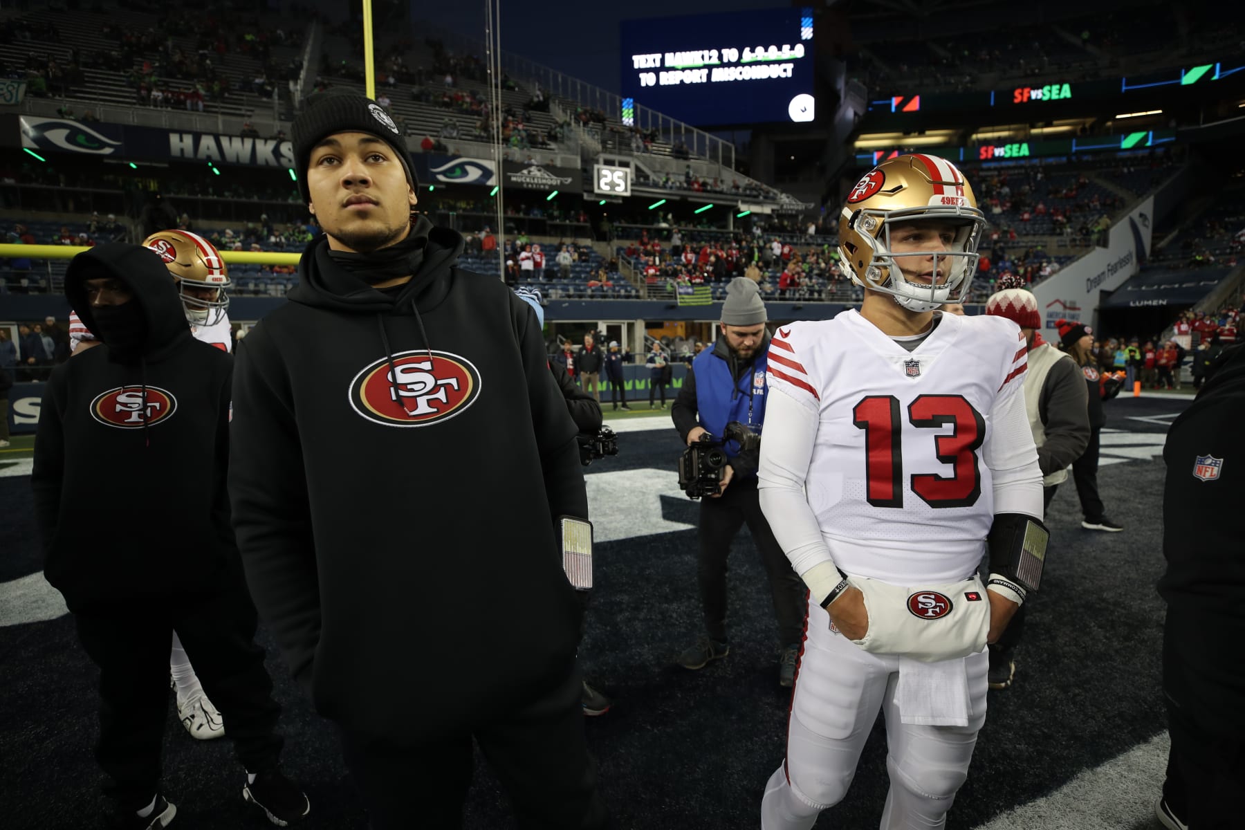SEATTLE, WA - DECEMBER 15: Trey Lance #5 and Brock Purdy #13 of the San Francisco 49ers on the field before the game against the Seattle Seahawks at Lumen Field on December 15, 2022 in Seattle, Washington. The 49ers defeated the Seahawks 21-13. (Photo by Michael Zagaris/San Francisco 49ers/Getty Images)