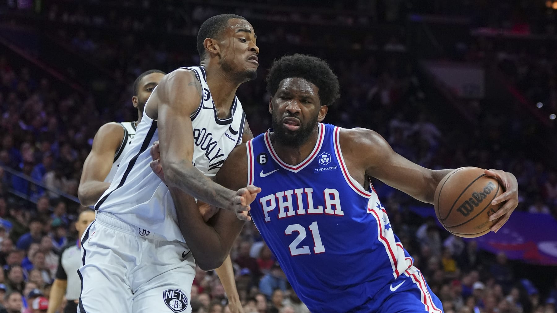 PHILADELPHIA, PA - APRIL 17: Joel Embiid #21 of the Philadelphia 76ers drives to the basket against Nic Claxton #33 of the Brooklyn Nets during Game Two of the Eastern Conference First Round Playoffs at the Wells Fargo Center on April 17, 2023 in Philadelphia, Pennsylvania. NOTE TO USER: User expressly acknowledges and agrees that, by downloading and or using this photograph, User is consenting to the terms and conditions of the Getty Images License Agreement. (Photo by Mitchell Leff/Getty Images)