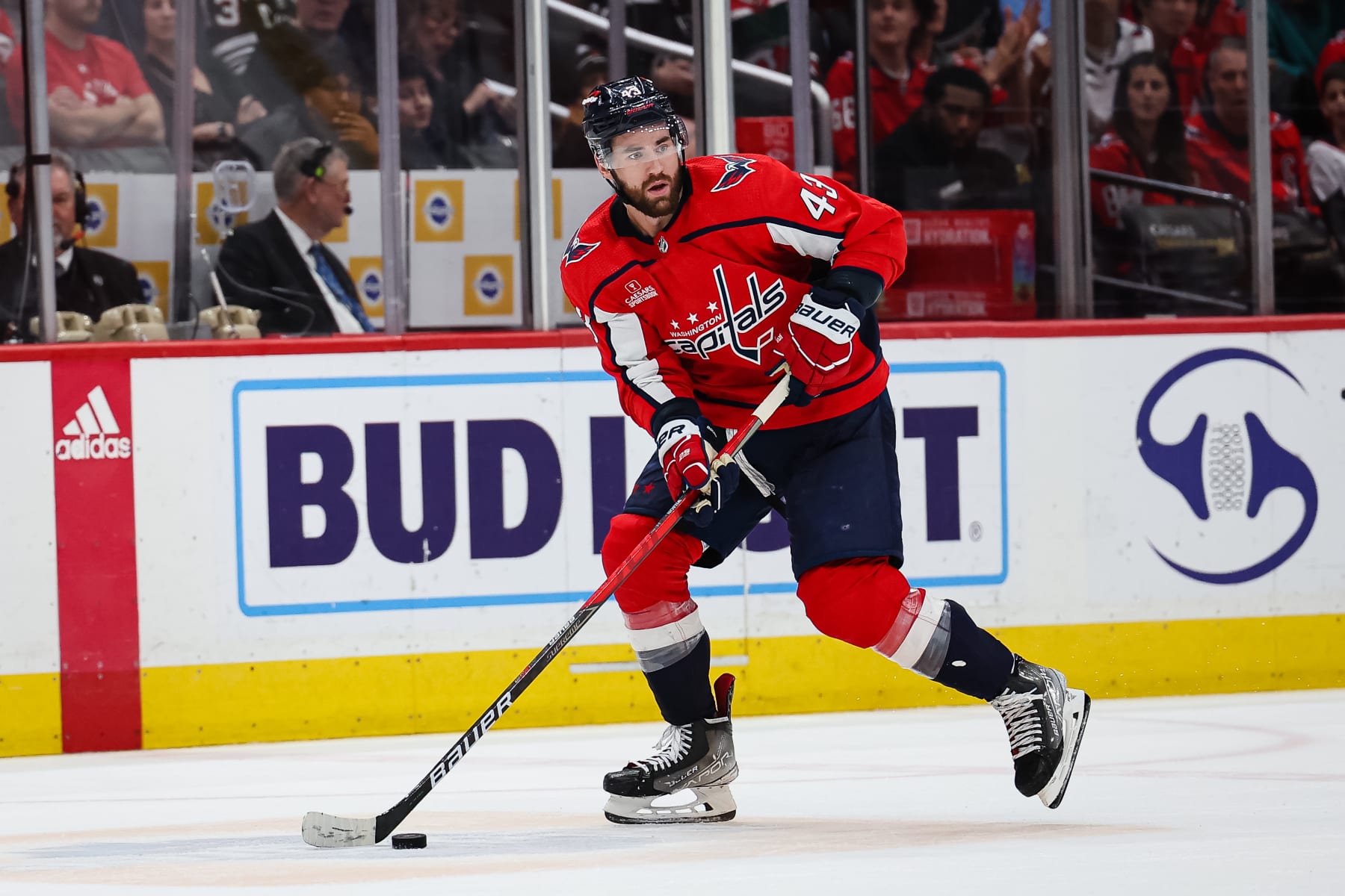 WASHINGTON, DC - APRIL 13: Tom Wilson #43 of the Washington Capitals skates with the puck against the New Jersey Devils during overtime of the game at Capital One Arena on April 13, 2023 in Washington, DC. (Photo by Scott Taetsch/Getty Images)