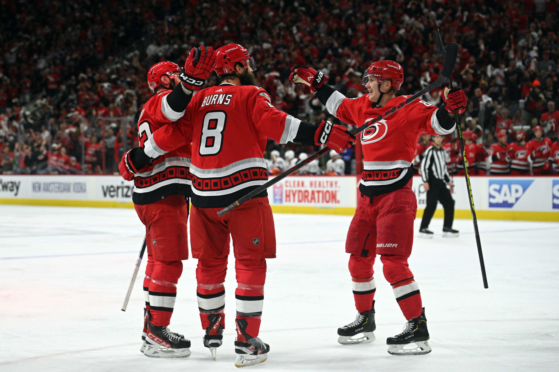 RALEIGH, NC - APRIL 19: Members of the Carolina Hurricanes celebrate scoring a goal during game 2 of the first round of the Stanley Cup Playoffs between the New York Islanders and the Carolina Hurricanes on April 19, 2023 at PNC Arena in Raleigh, North Carolina. (Photo by Katherine Gawlik/Icon Sportswire via Getty Images)