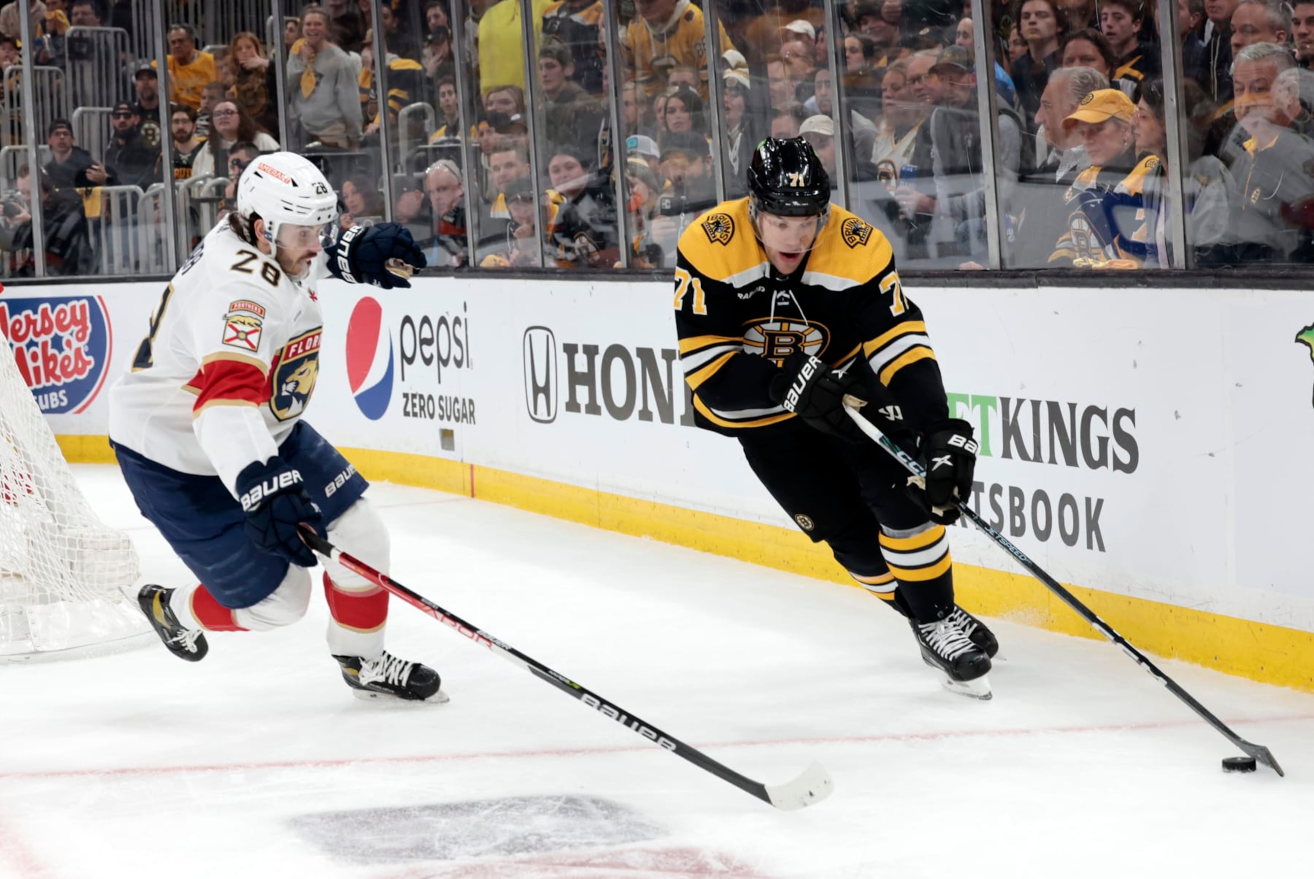 BOSTON, MA - APRIL 19: Florida Panthers defenseman Josh Mahura (28) moves in on Boston Bruins left wing Taylor Hall (71) during Game 2 of an Eastern Conference First Round playoff contest between the Boston Bruins and the Florida Panthers on April 19, 2023, at TD Garden in Boston, Massachusetts. (Photo by Fred Kfoury III/Icon Sportswire via Getty Images)