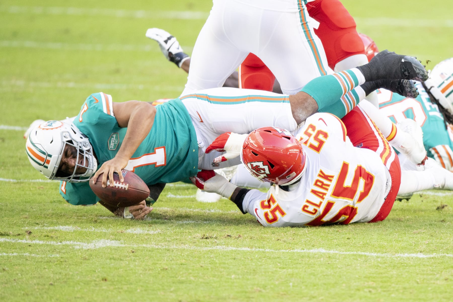 Dolphins quarterback Tua Tagovailoa hits the ground after being sacked. 