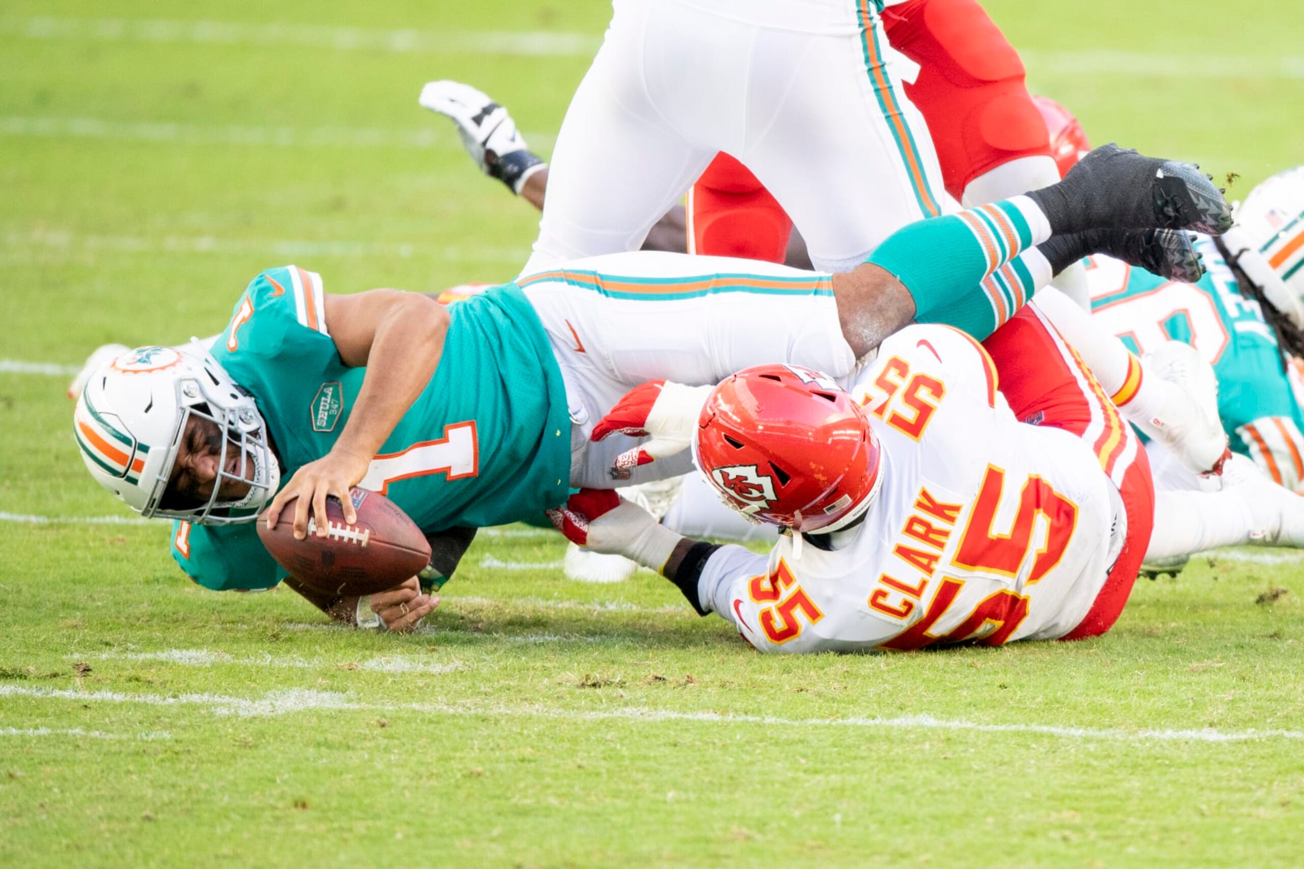 Dolphins quarterback Tua Tagovailoa hits the ground after being sacked. 