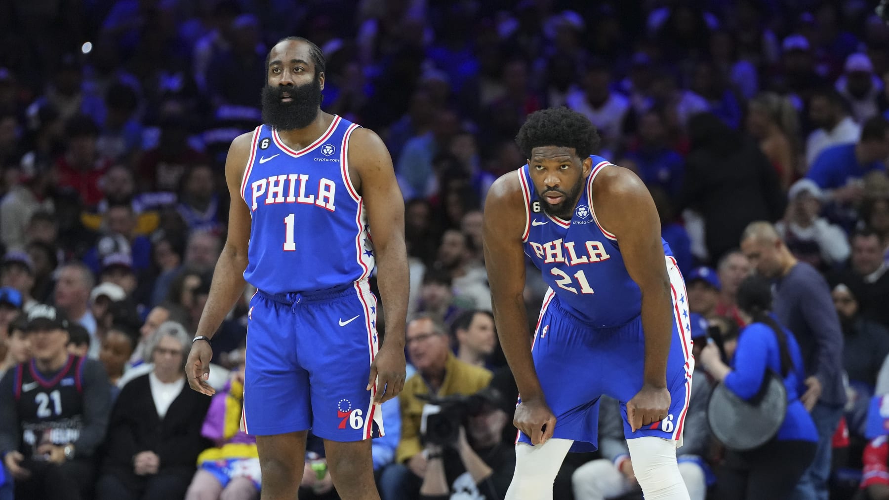 PHILADELPHIA, PA - APRIL 17: James Harden #1 and Joel Embiid #21 of the Philadelphia 76ers look on against the Brooklyn Nets during Game Two of the Eastern Conference First Round Playoffs at the Wells Fargo Center on April 17, 2023 in Philadelphia, Pennsylvania. NOTE TO USER: User expressly acknowledges and agrees that, by downloading and or using this photograph, User is consenting to the terms and conditions of the Getty Images License Agreement. (Photo by Mitchell Leff/Getty Images)